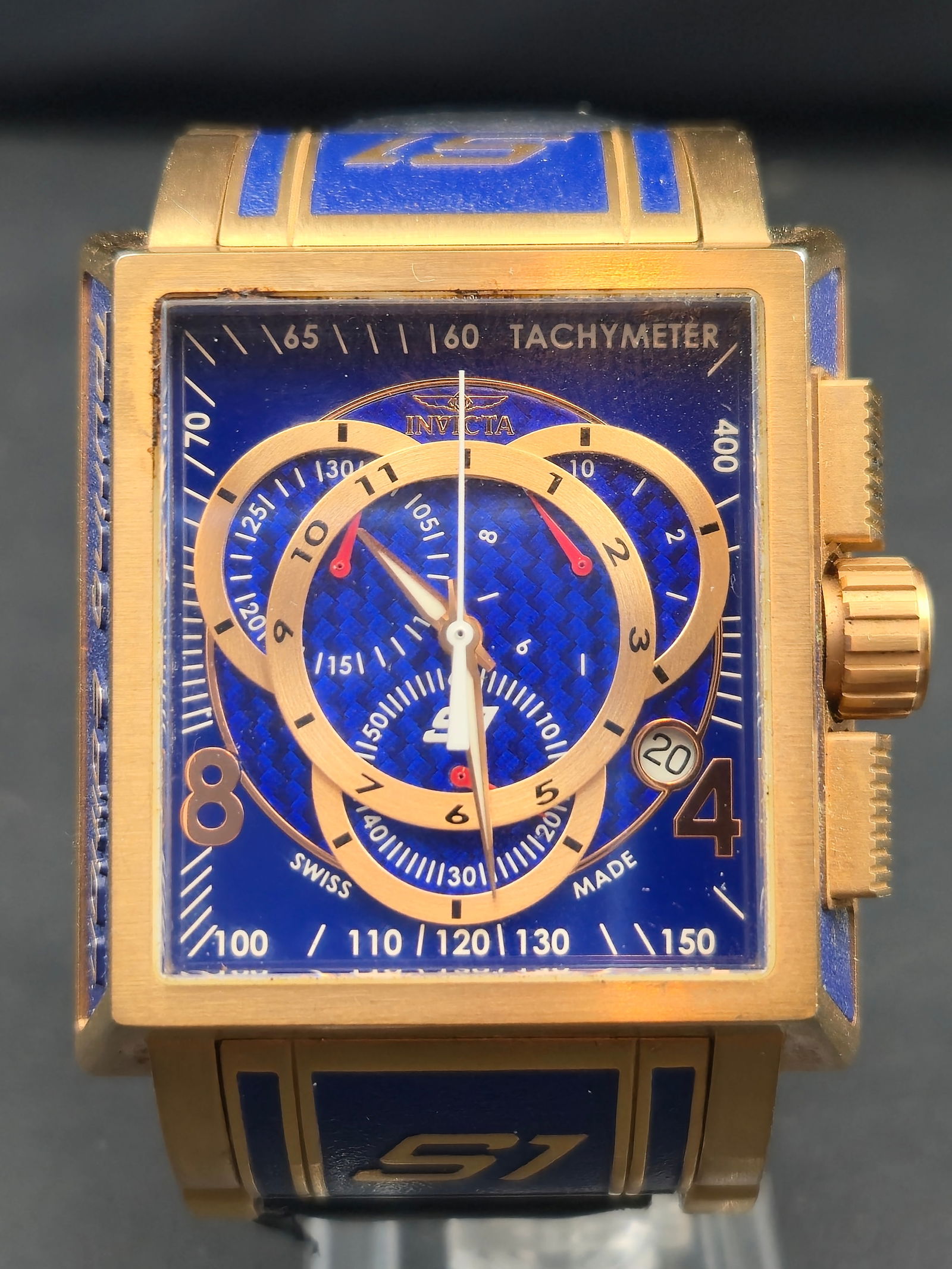 Invicta S1 Rally 11689 Swiss Chronograph – Gold/Blue 44mm Touring Edition – New Battery –: Invicta S1 Rally Model 11689 “Touring Edition” Swiss-made chronograph featuring a bold square 44mm case, gold-tone finish, blue racing-style enamel accents, and carbon-pattern dial with 1/10th