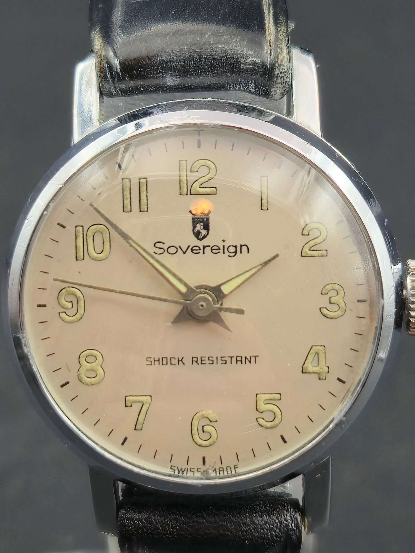 Sovereign 29mm Swiss Mechanical Military Dial Watch – Runs, Mint: Vintage Sovereign Swiss-made mechanical wristwatch featuring a clean military-style dial with luminous Arabic numerals, luminous hands, and the Sovereign crest. The cream dial is in mint cosmetic cond