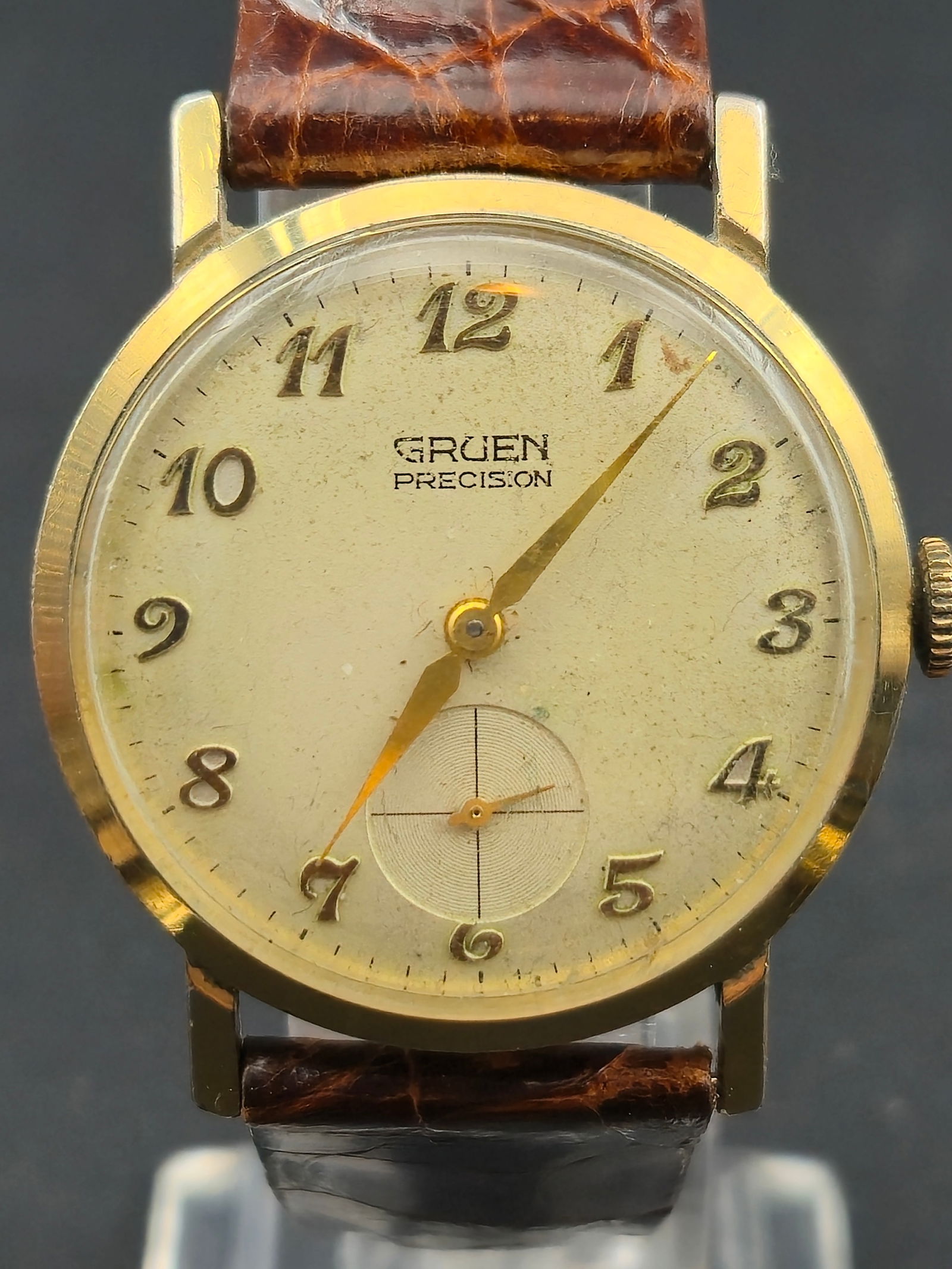1960s Gruen Precision 17 Jewel Swiss Watch 31mm Gold Tone Case Sub Seconds Runs Vintage Dress: Vintage 1960s Gruen Precision wristwatch powered by a Swiss 17-jewel Gruen Watch Co. movement with sub-seconds dial. The watch features a gold-tone bezel, 10K RGP back, Arabic numeral dial, and a brow
