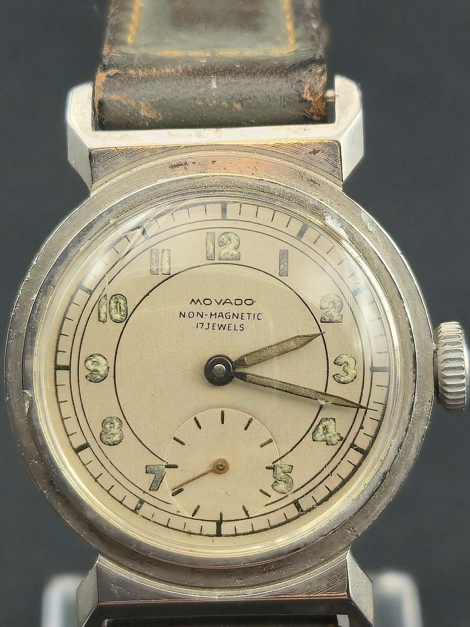 1940s Movado Non-Magnetic 29mm Stainless Steel Vintage Watch w/ Sub-Seconds Running: Presented is a 1940s Movado Non-Magnetic wristwatch housed in a stainless-steel Movado case with original factory engravings and multiple historical service marks. The watch features its original two-