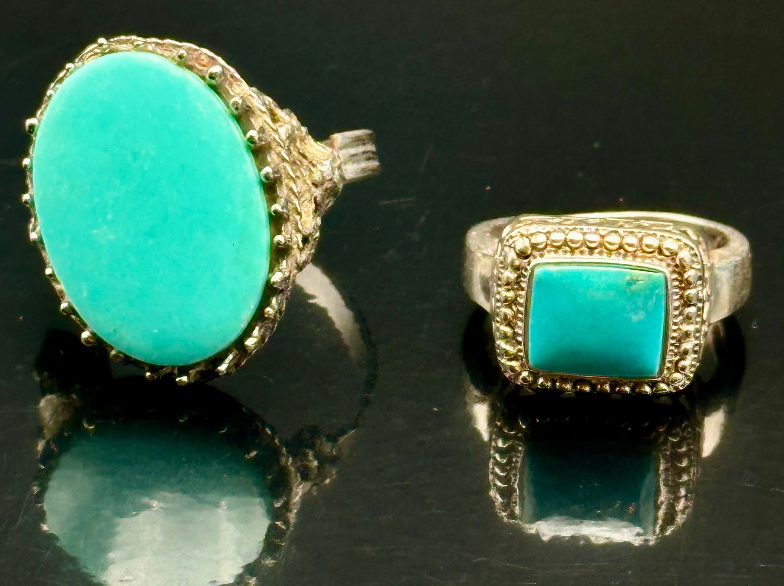 Pair of Sterling Silver Turquoise Rings – 17g Total: Lot of two vintage sterling silver turquoise rings, both marked .925 (one also marked N). Each ring features natural turquoise stones set in ornate sterling frames. Total combined weight 17 grams. Nic