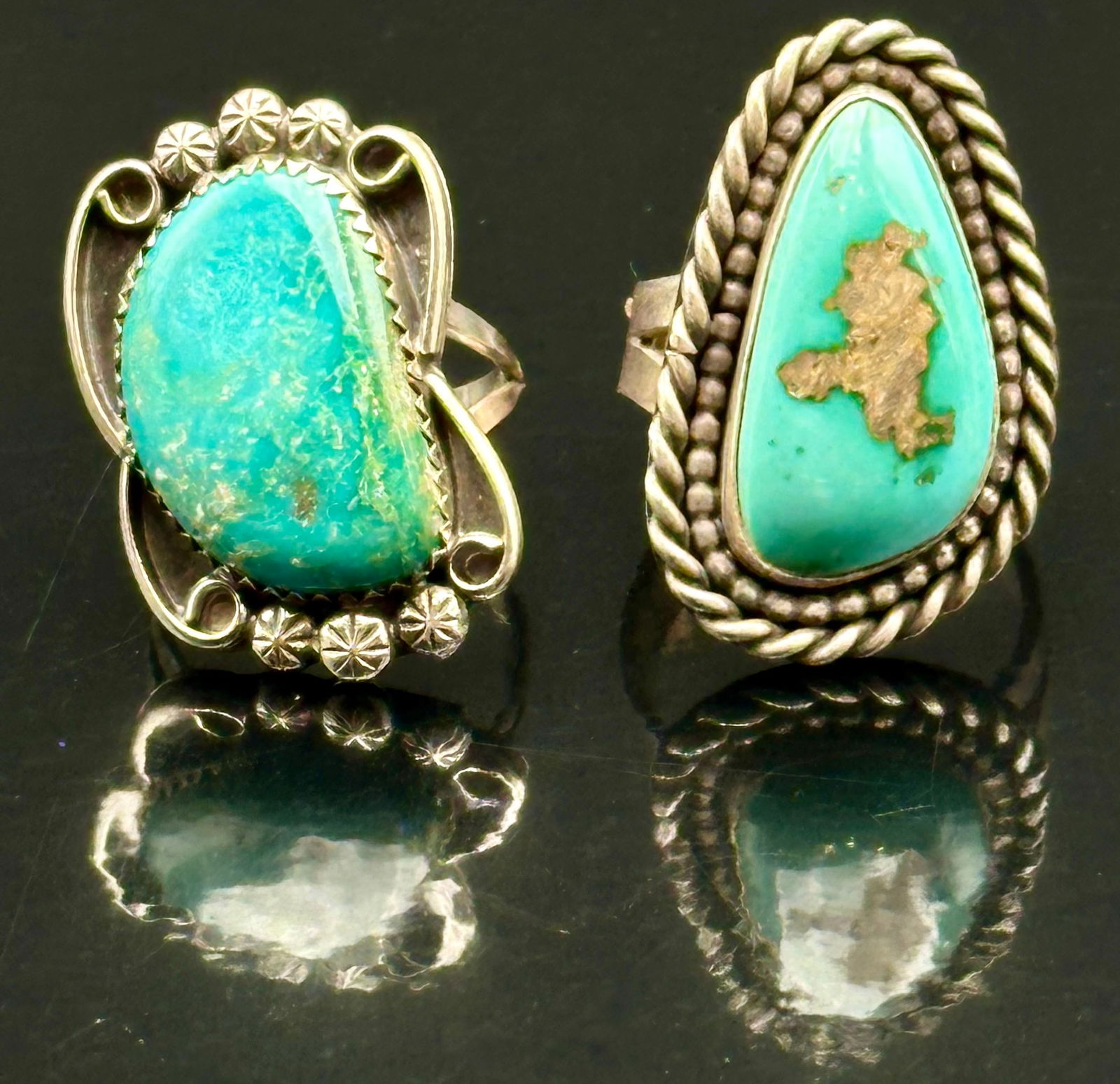 2 Sterling Turquoise Rings Lot – 19g: Lot of two vintage sterling silver turquoise rings. Both marked Sterling. Nice stones with natural matrix, classic Navajo-style designs. Total weight 19g. Selling as-is.