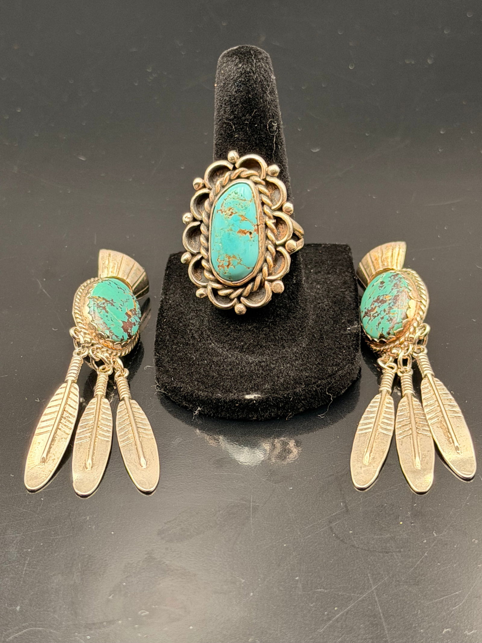 This is a pair of handmade Navajo sterling silver blue turquoise dangle earrings with omega backs. (1 of 8)
