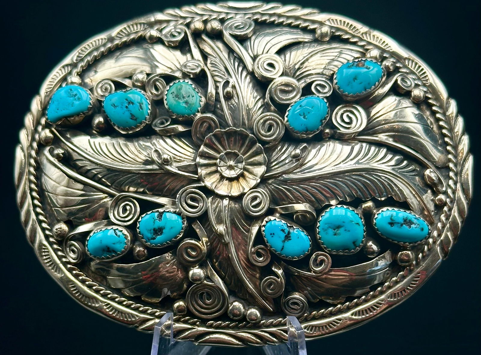 Vintage Navajo M. Thomas Jr. Sterling Silver Turquoise Belt Buckle – 77g: Beautiful vintage Navajo sterling silver belt buckle signed M. Thomas Jr.. Heavy piece (77 grams) with classic hand-tooled leafwork, rope accents, and 9 natural turquoise stones. Great patina, handmad