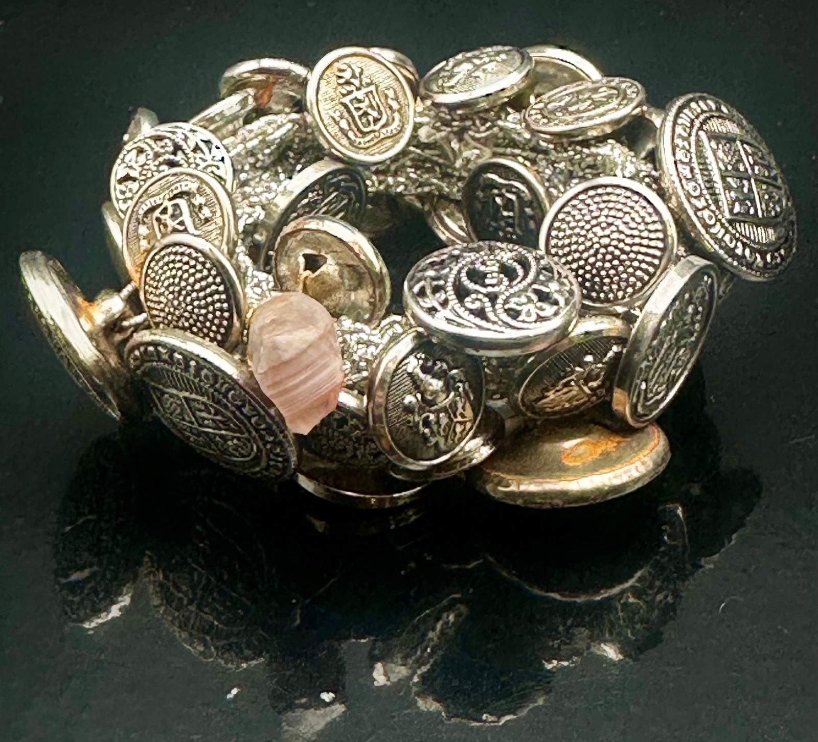 Vintage Chunky Button Charm Bracelet – Mixed Metal Buttons & Stones, one size: Unique vintage button charm bracelet loaded with many different metal buttons and a few stone charms. Heavy, bold style with great movement. Buttons have different patterns and textures, giving it a c