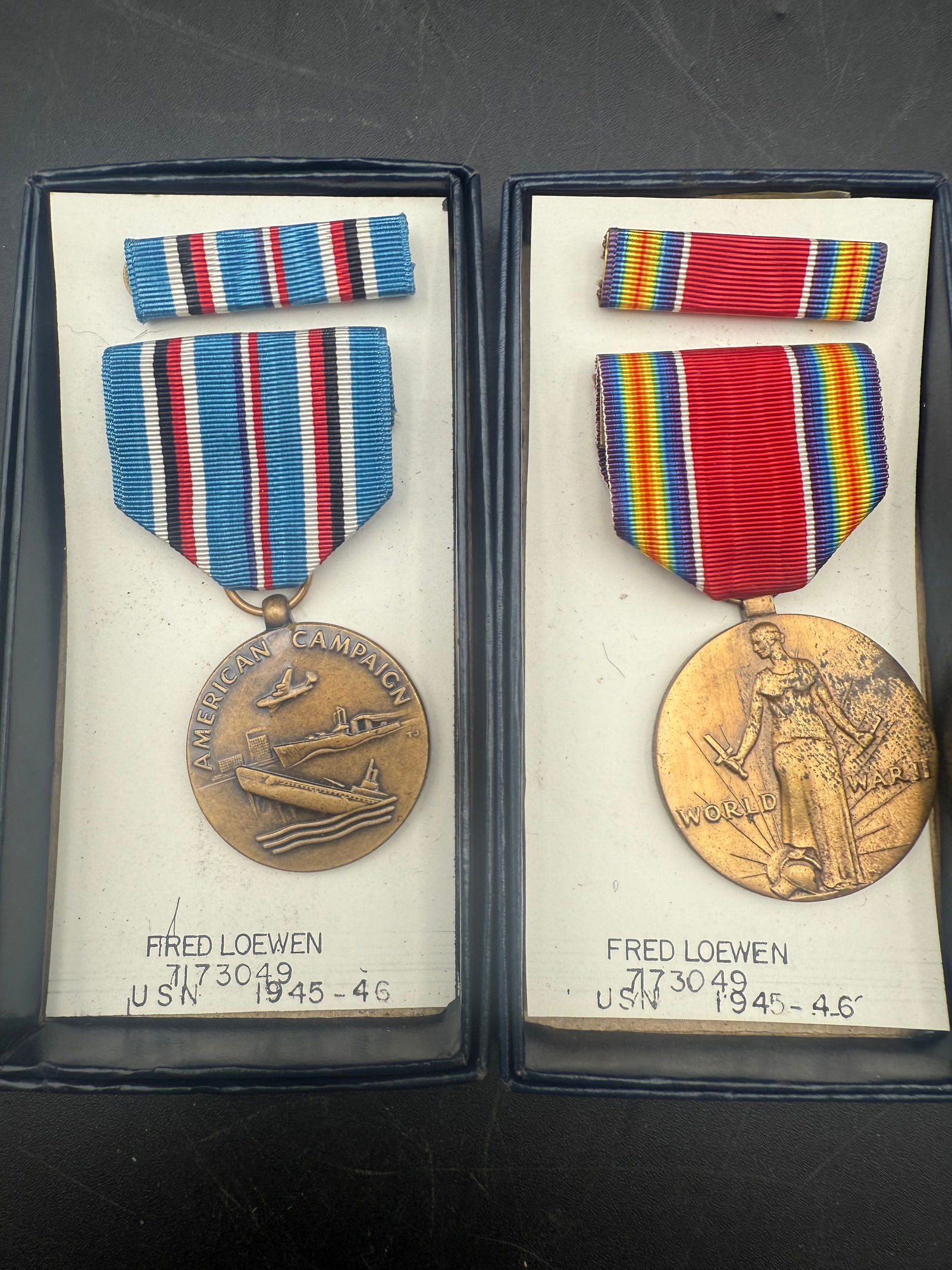 shows two U.S. military service medals awarded to "Fred Loewen (1 of 7)
