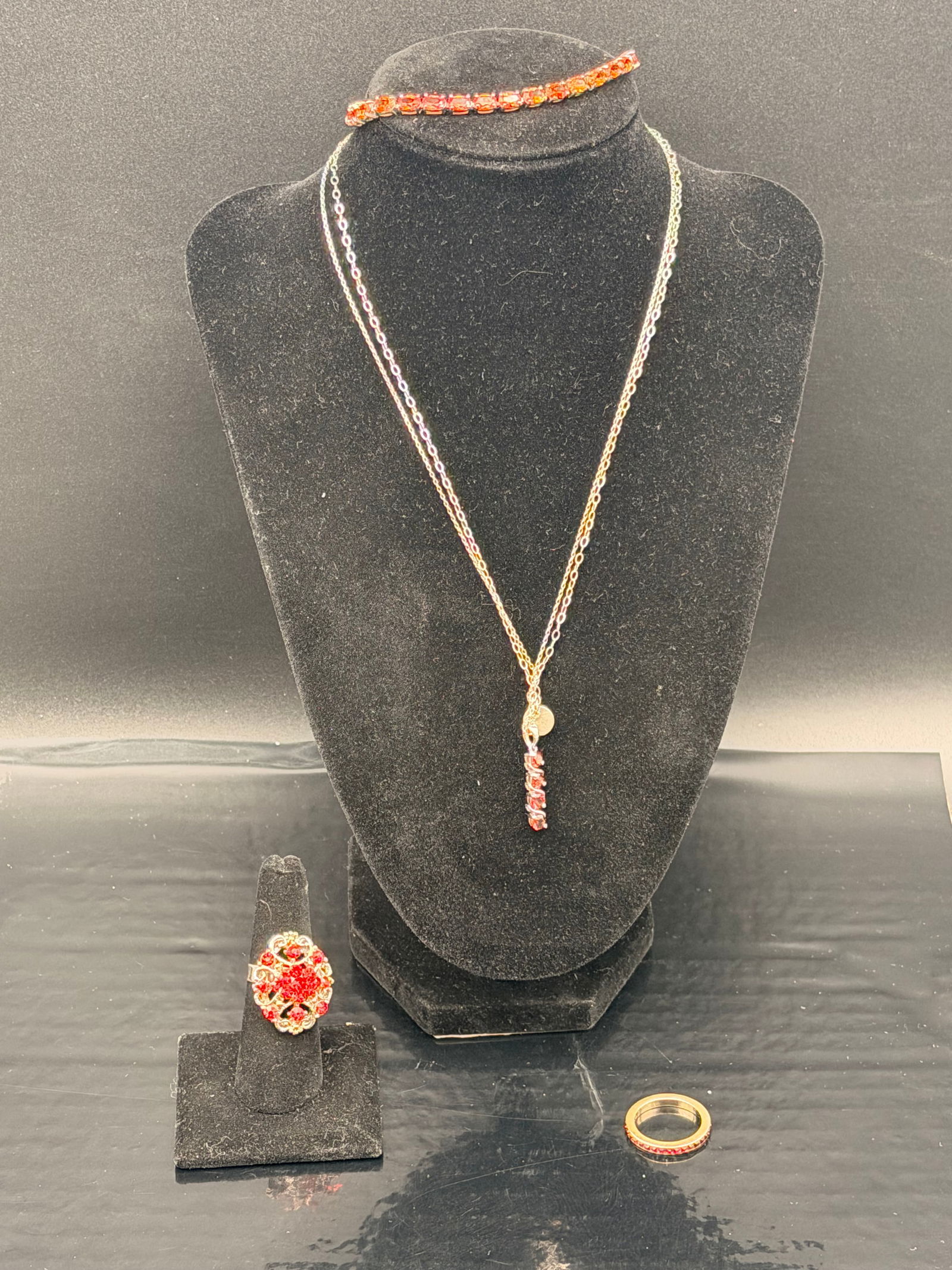 Sterling Silver 925 & 12K GF Red Gemstone Jewelry Lot – Necklace, Bracelet & Rings: Beautiful red gemstone jewelry set featuring a mix of sterling silver and gold-filled pieces. The set includes a 925 Dogeared pendant necklace with vibrant red-orange stones, a matching 925 KH Thailan