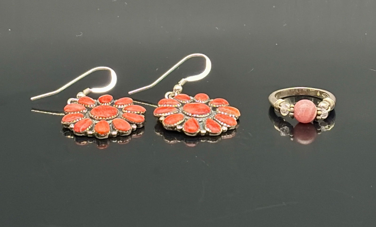 Coral Flower Earrings & Pink Stone Ring: Charming jewelry lot featuring a pair of bohemian-style drop earrings and a coordinating ring. The earrings are crafted in a floral motif with petal-shaped coral-colored stones arranged around a centr