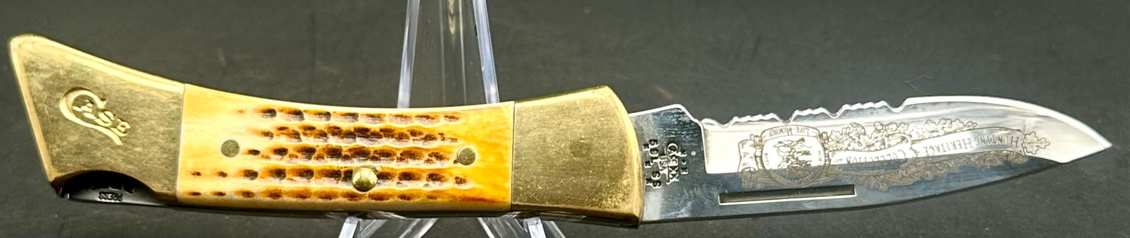 Case XX 504 SS NAHC Life Member Knife – 1985 Bone Handle Lockback: Vintage Case XX USA 504 SS lockback folding knife from the North American Hunting Club – Hunting Heritage Collection, dated to 1985 (5-dot tang stamp). Features a jigged bone handle, brass bolsters,