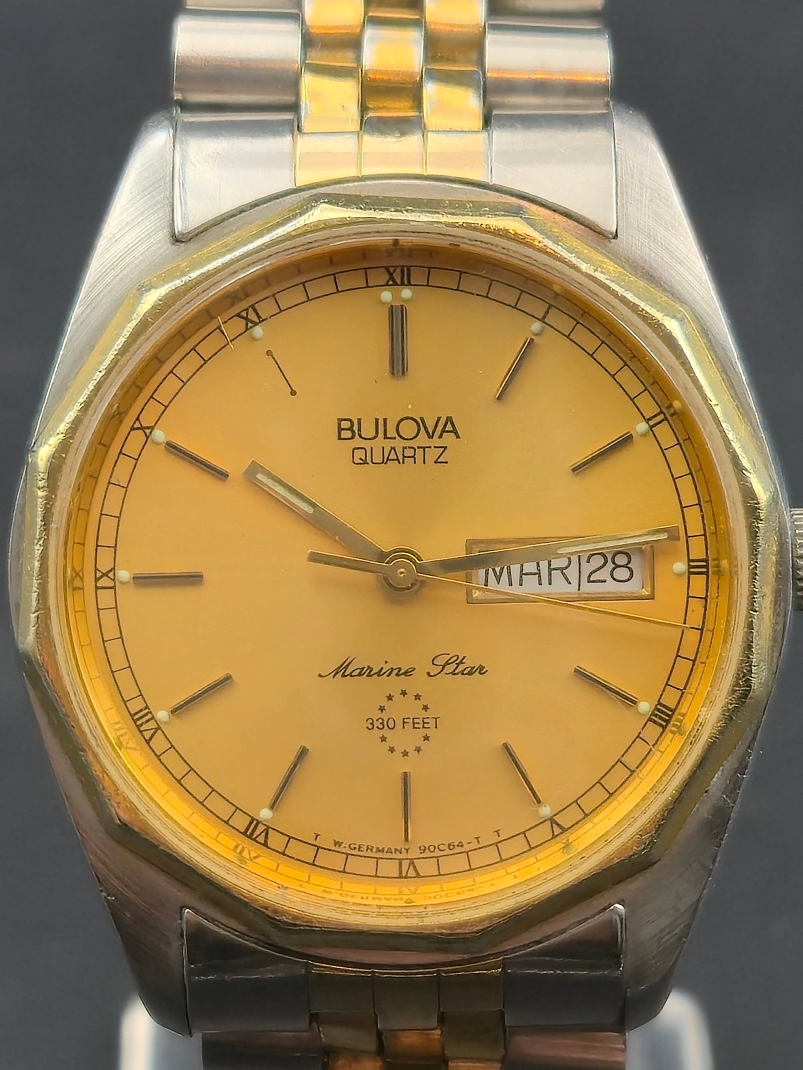 1987 Bulova Marine Star 33mm Two-Tone Quartz Watch W. Germany Dial New Battery Running & Keeping Tim: Classic 1987 Bulova Marine Star quartz watch featuring a two-tone stainless steel case with gold-tone bezel and a matching two-tone jubilee-style bracelet. The champagne dial is marked “W. Germany&r