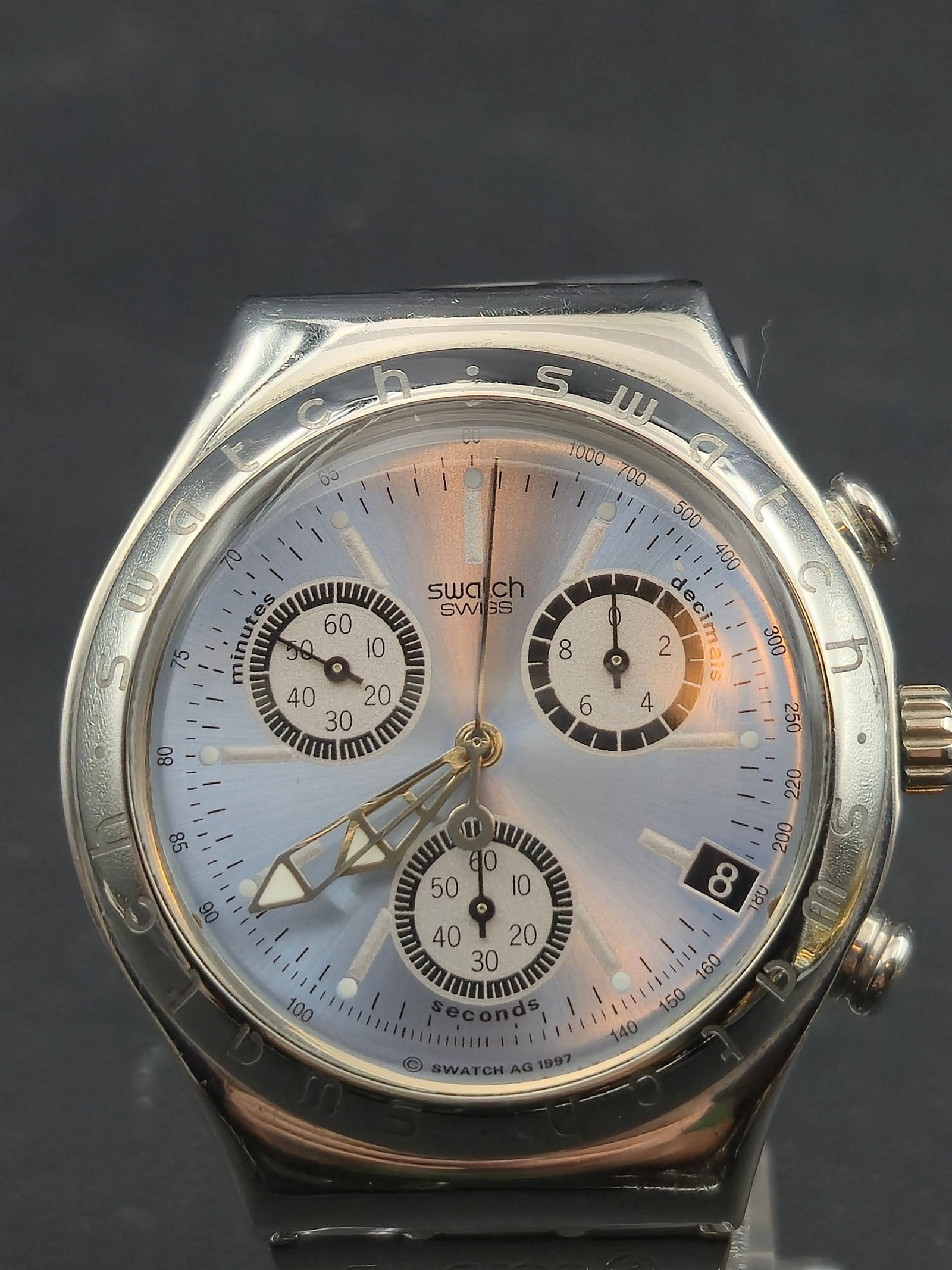 Swatch Irony 40mm Stainless Steel Chronograph 1997 Quartz Silver Dial New Battery Running & Keeping: Classic 1997 Swatch Irony stainless steel chronograph featuring a 40mm case and integrated Swatch stainless bracelet. Silver sunburst dial with triple-register chronograph layout, date window at 4 o��