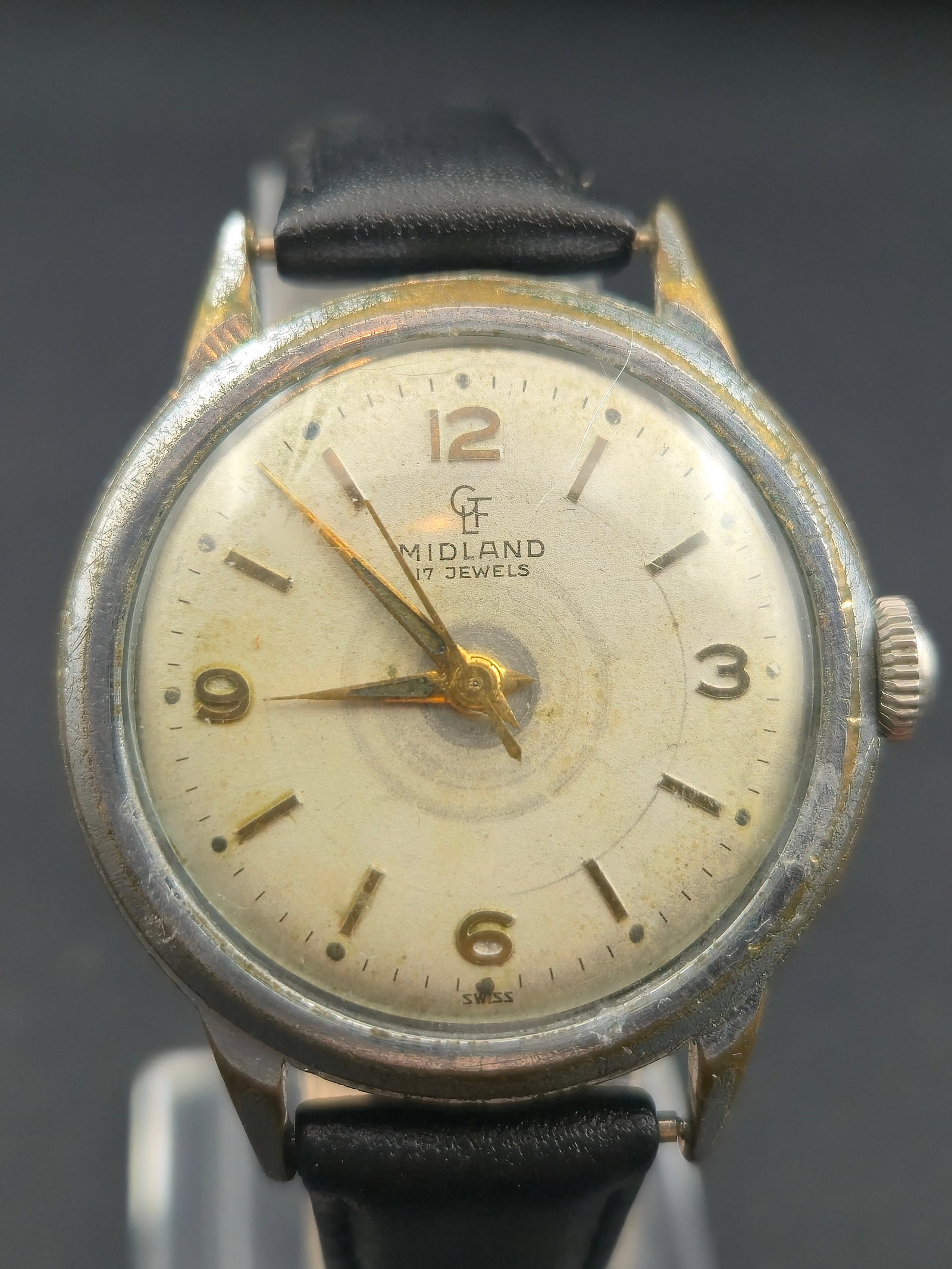 1950s Midland AS 1430 32mm Swiss 17J Manual-Wind Dress Watch Running: Offered is a 1950s Midland Swiss-made wristwatch powered by the reliable A. Schild 1430 hand-wind movement with 17 jewels. The watch features a classic mid-century dial layout with raised numerals at 