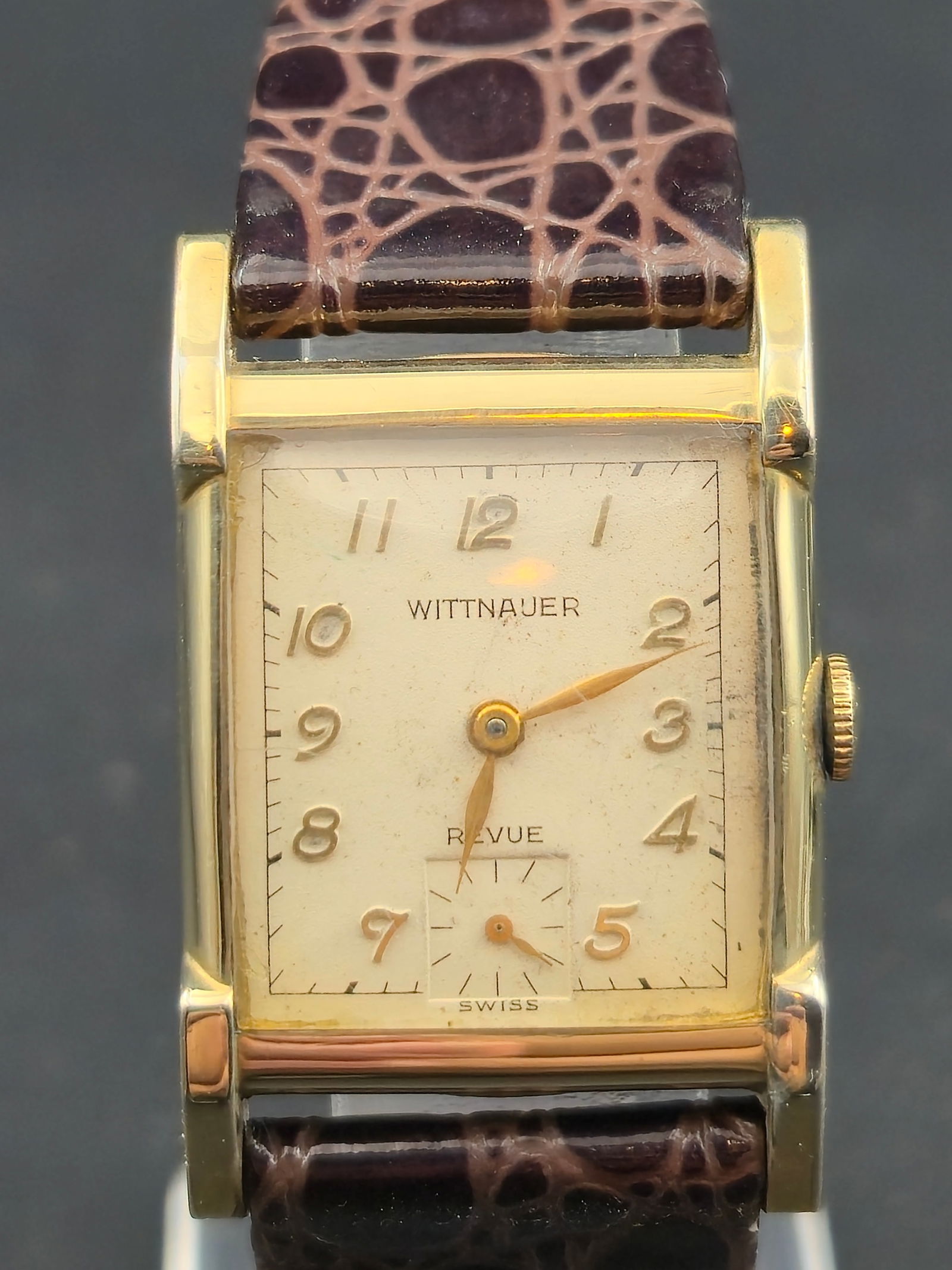 1946 Wittnauer Revue 10K GF 23mm Tank Watch 17J Cal. 73 – Running: Elegant post-war Wittnauer Revue tank-style wristwatch, presented in 1946 for 25 years of service, with a beautifully preserved 10K gold-filled case by Star Watch Case Co. Features a clean Art Deco sq