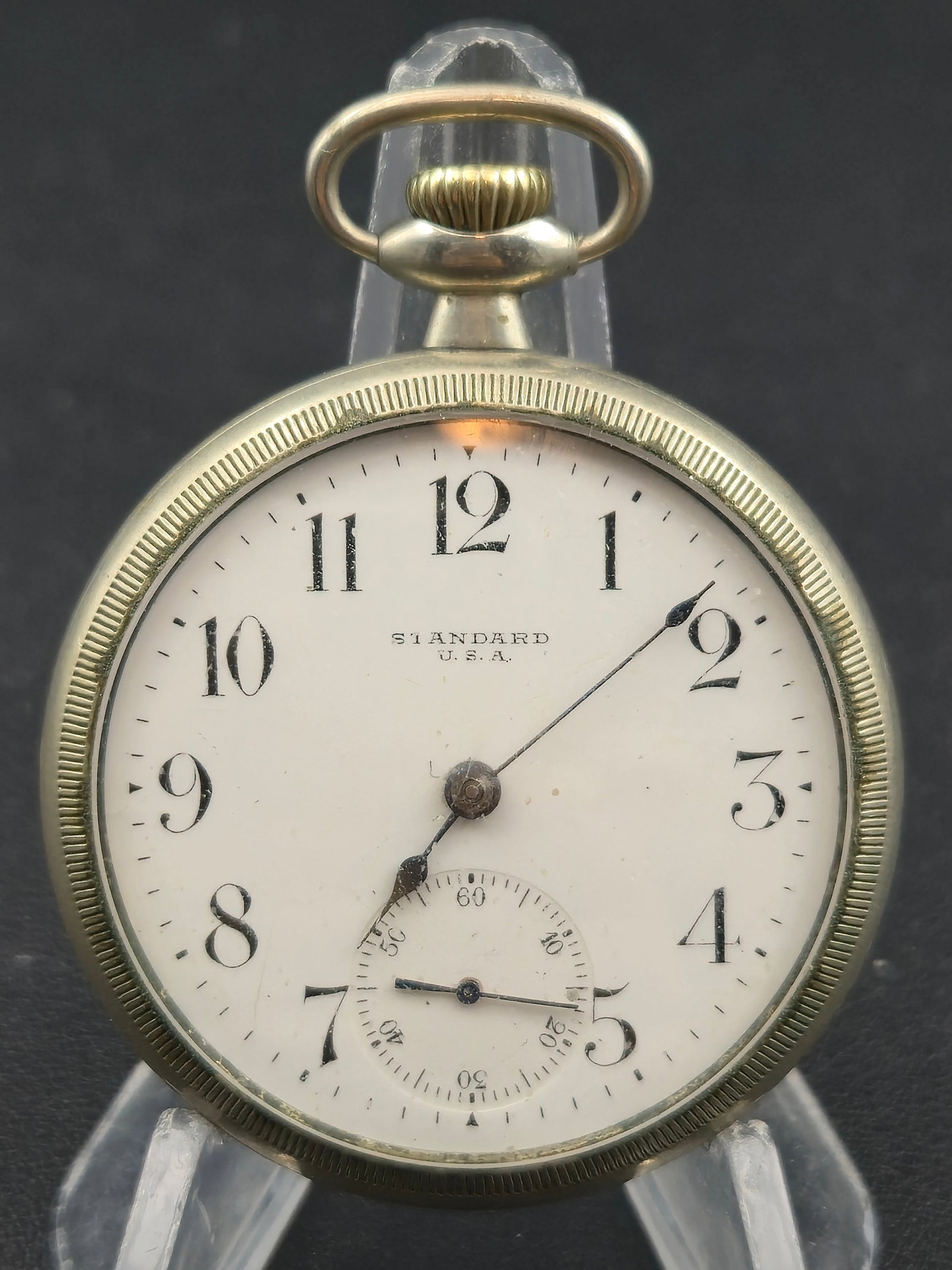 Standard U.S.A. 15J Wadsworth Nickel Pocket Watch: vintage Standard U.S.A. 15-jewel pocket watch housed in a durable Wadsworth Nickel case, featuring a clean white enamel dial with bold Arabic numerals and a subsidiary seconds register. Powered by a 1