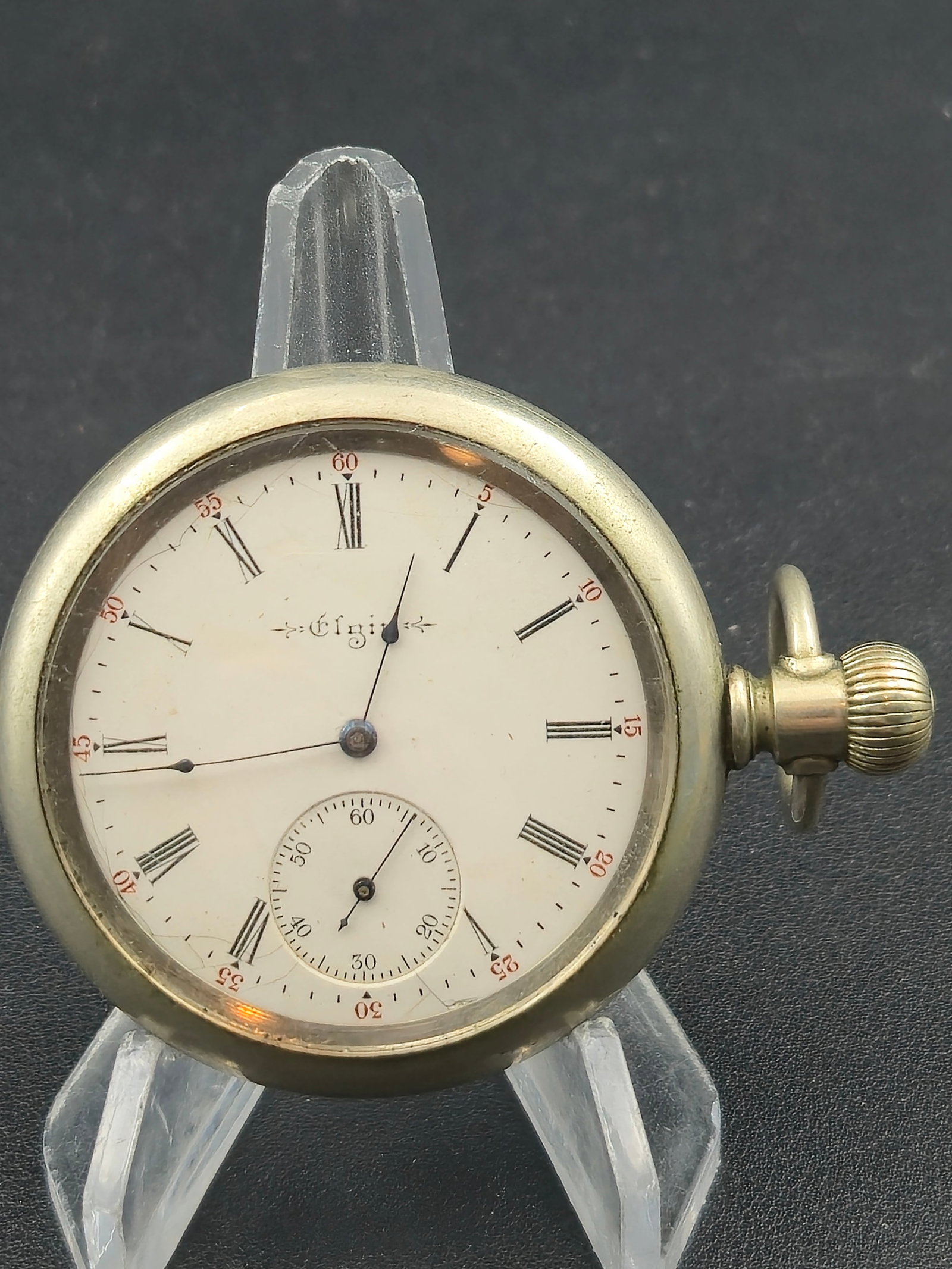 1904 Elgin 16S 7J Grade 290 Sidewinder Pocket Watch Runs: 1904 Elgin Grade 290 pocket watch in classic sidewinder configuration, featuring a white enamel Roman numeral dial with red outer minute track and blued spade hands. The 7 jewel movement displays dama