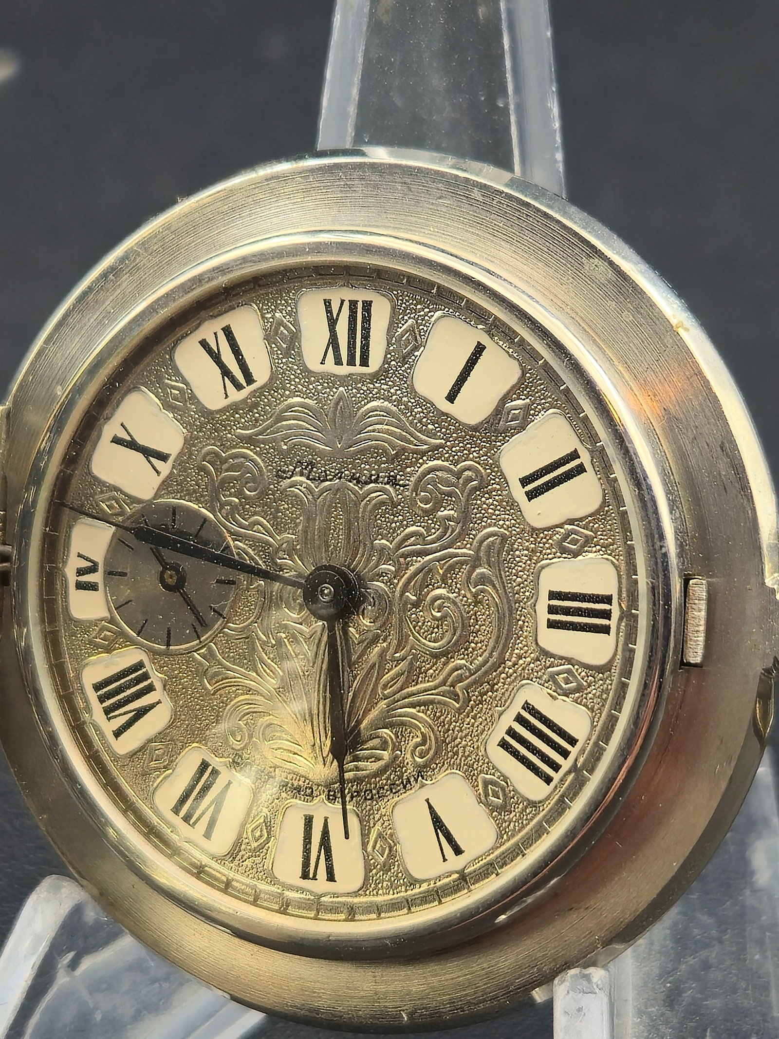 Vintage Swiss 49mm 7J Fancy Dial Floral Hunter Pocket Watch Runs: vintage Swiss-made hunter pocket watch featuring an ornate floral-engraved case and a highly decorative embossed fancy dial with Roman numeral cartouches. This piece measures approximately 49mm and ho