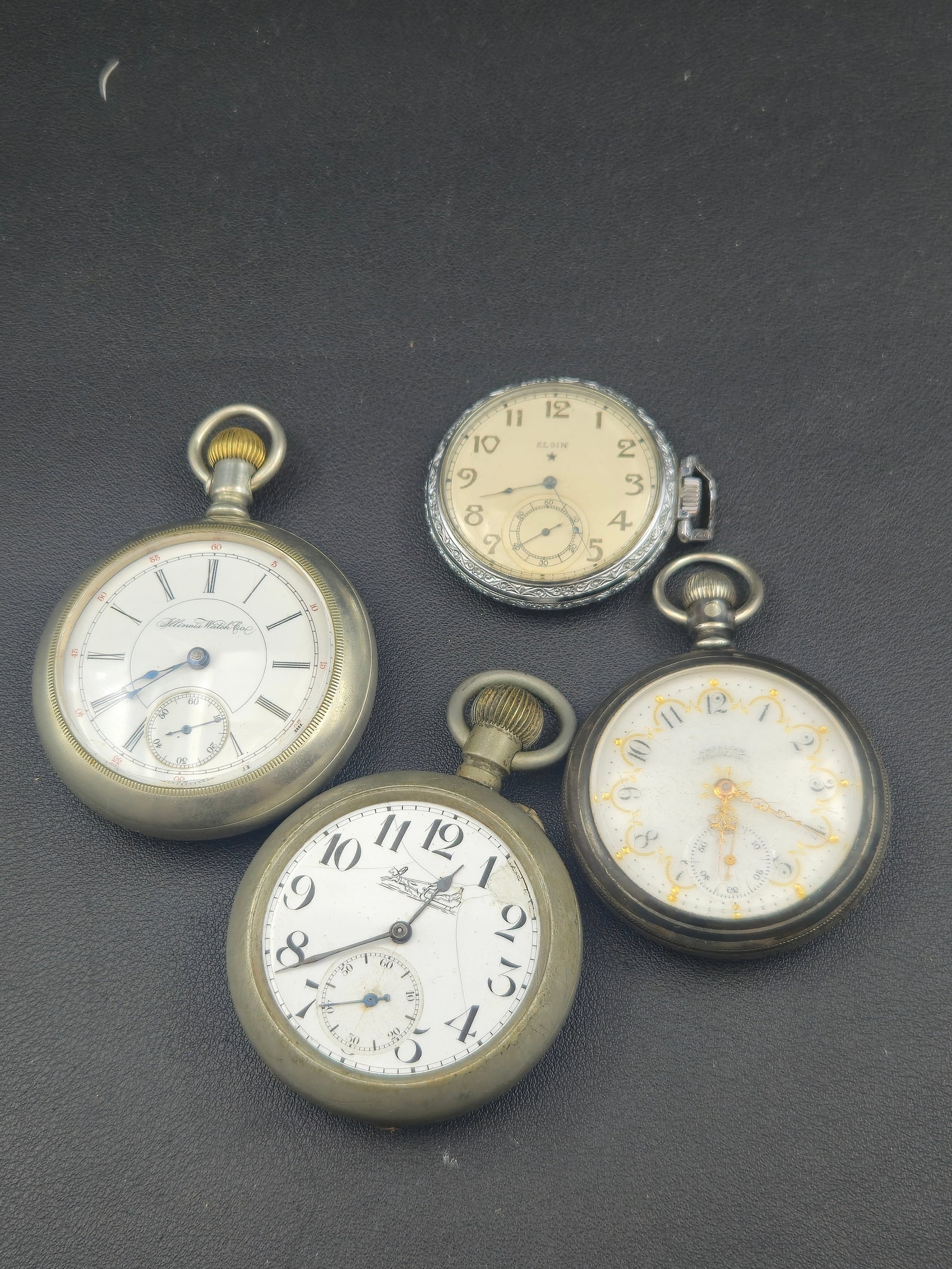 Lot of 4 Antique Pocket Watches, Illinois, Waltham Fancy Dial, Elgin, Swiss, Untested: Group lot of four antique pocket watches offered together, exactly as shown in the photographs. This lot includes one Illinois pocket watch, one Waltham pocket watch with a fancy decorative dial, one