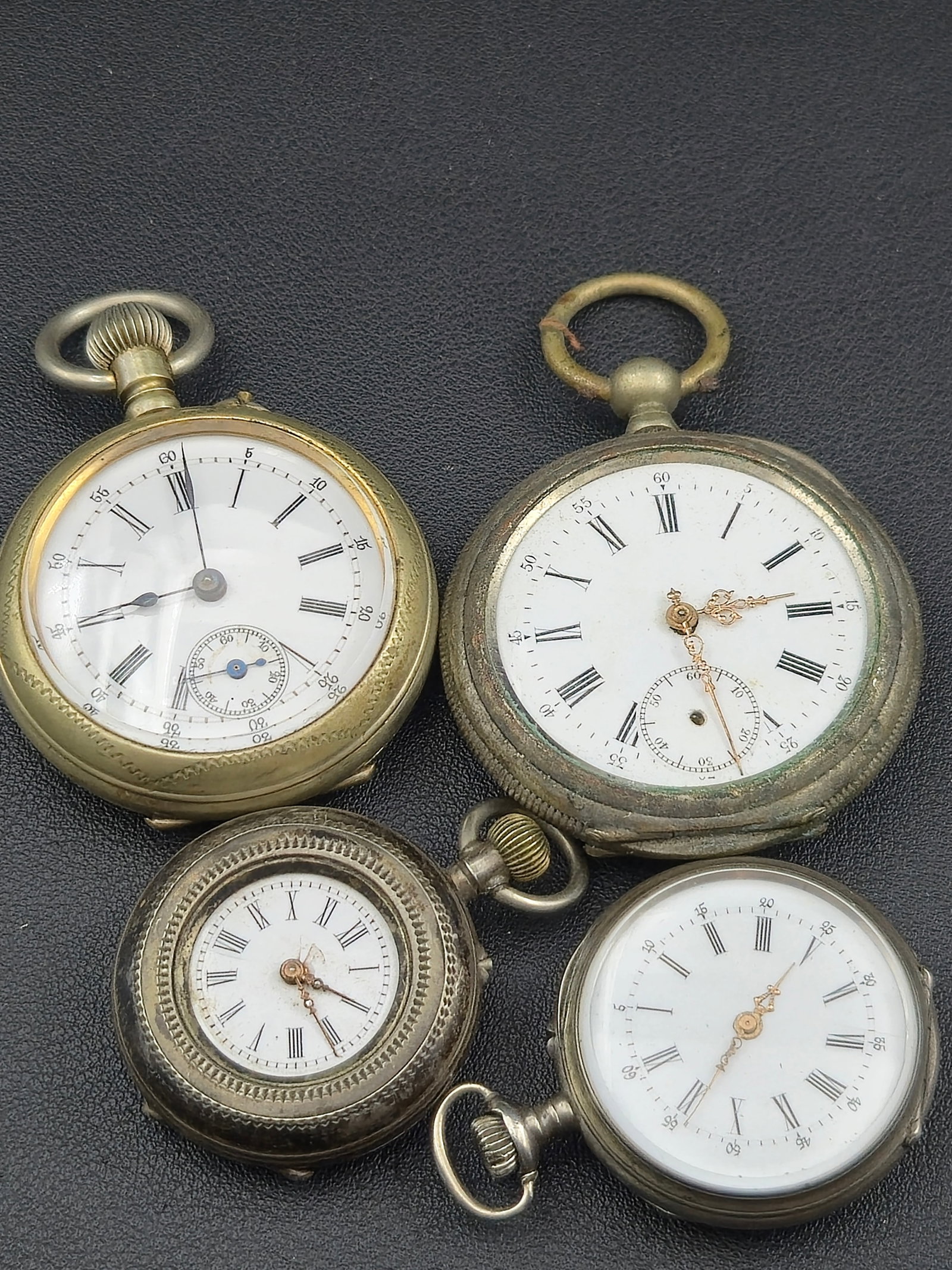 Lot of 4 Antique Swiss Pocket Watches Remontoir Cylindre Silver Cases Roman Dials Untested: Group of four antique Swiss pocket watches offered together as a single lot. All watches feature mechanical Remontoir Cylindre (cylinder escapement) movements housed in silver cases with ornate engrav