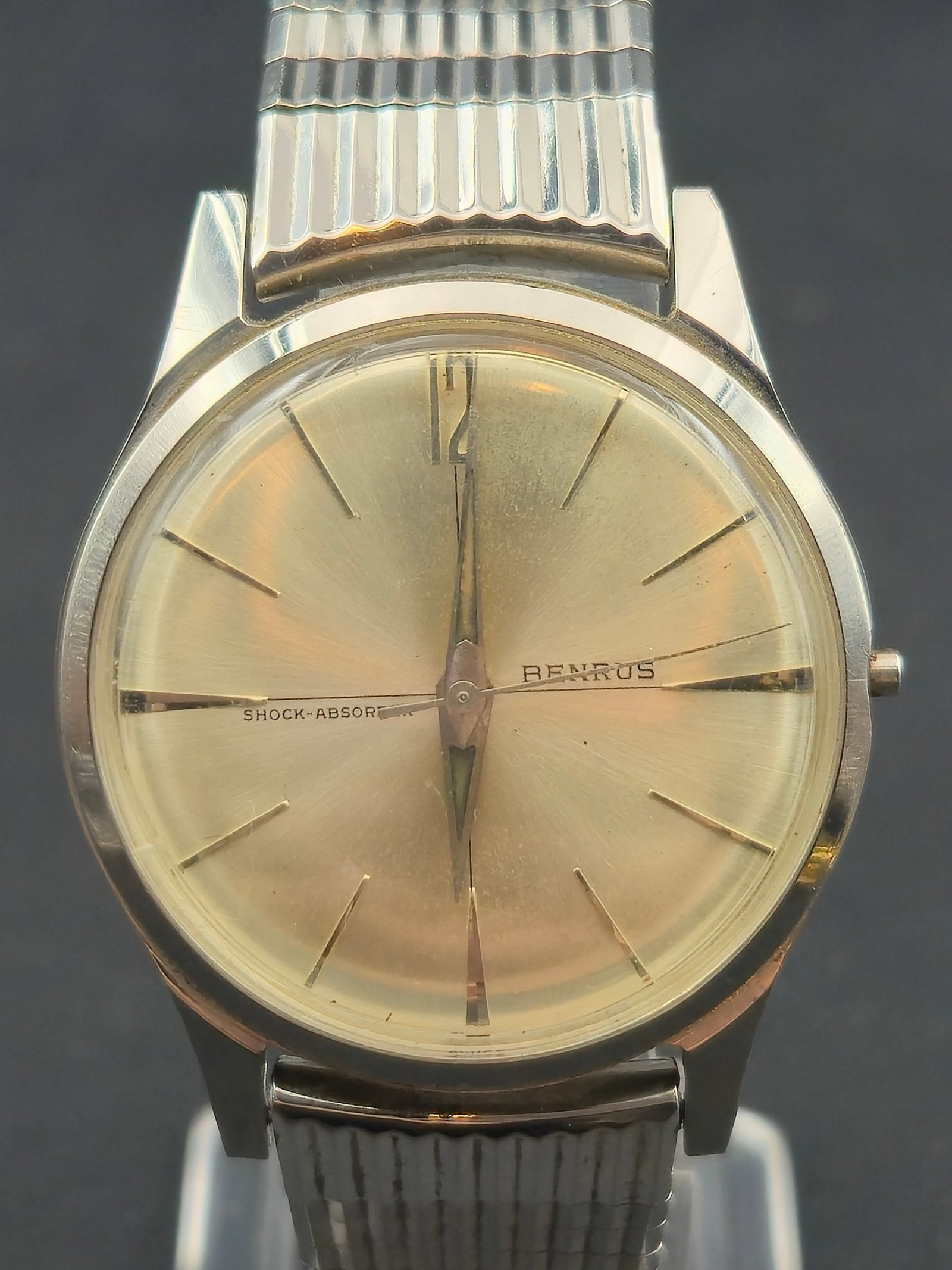 Vintage Benrus Swiss Wristwatch Waterproof Shock Protected 33.8mm Steel Back Untested: Vintage Swiss-made Benrus wristwatch featuring a clean silver-tone dial with applied baton hour markers and matching hands. Stainless steel case with screw-back marked “Waterproof & Shock Protected.