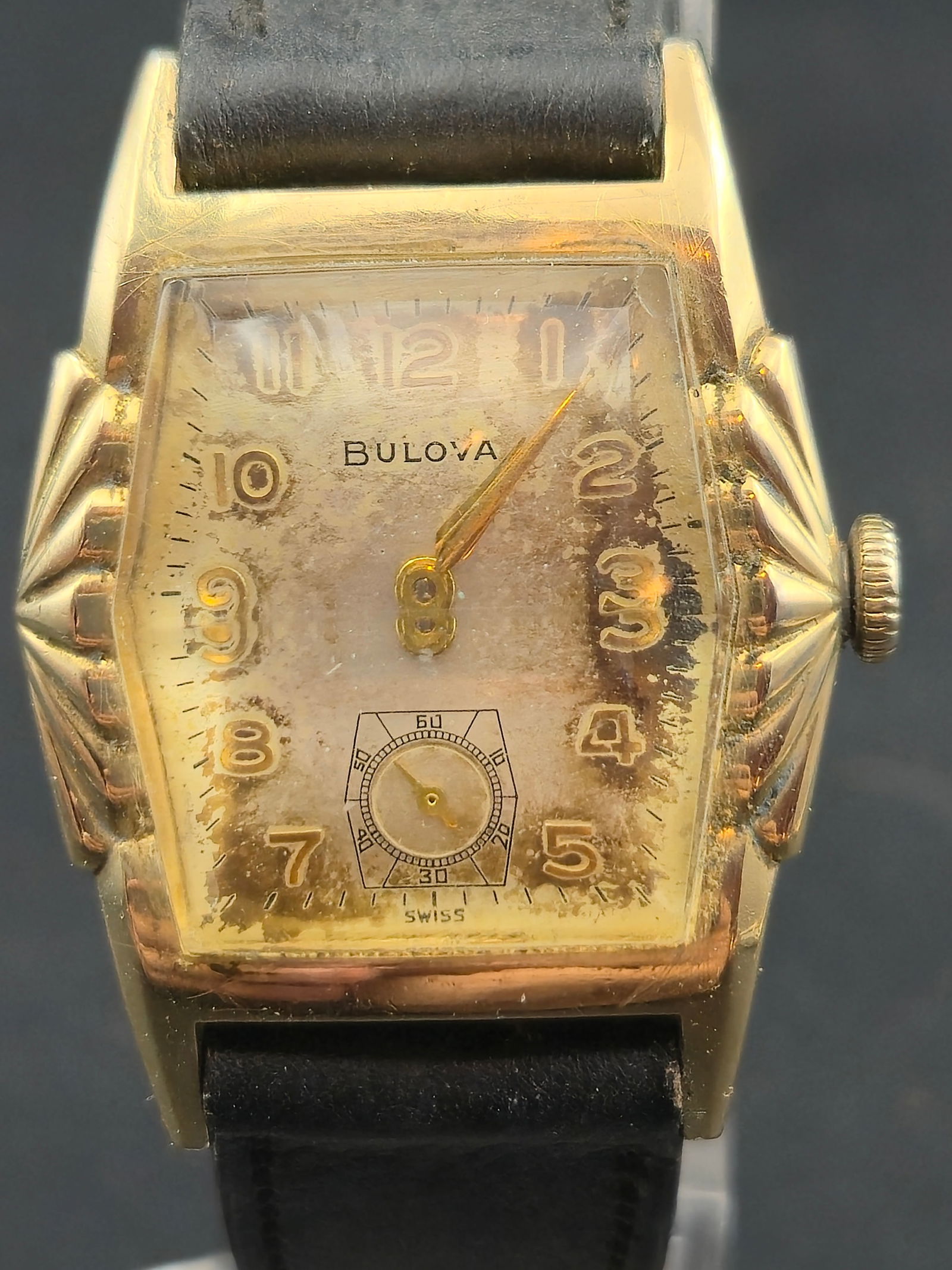 1955 Bulova Rectangular Wristwatch Cal 11AC 17J Small Seconds Gold-Tone Case 27.7mm: Vintage Bulova rectangular wristwatch from 1955 featuring a silvered dial with applied gold-tone Arabic numerals, stepped minute track, and a subsidiary seconds register at 6 o’clock. Dial signed Bu