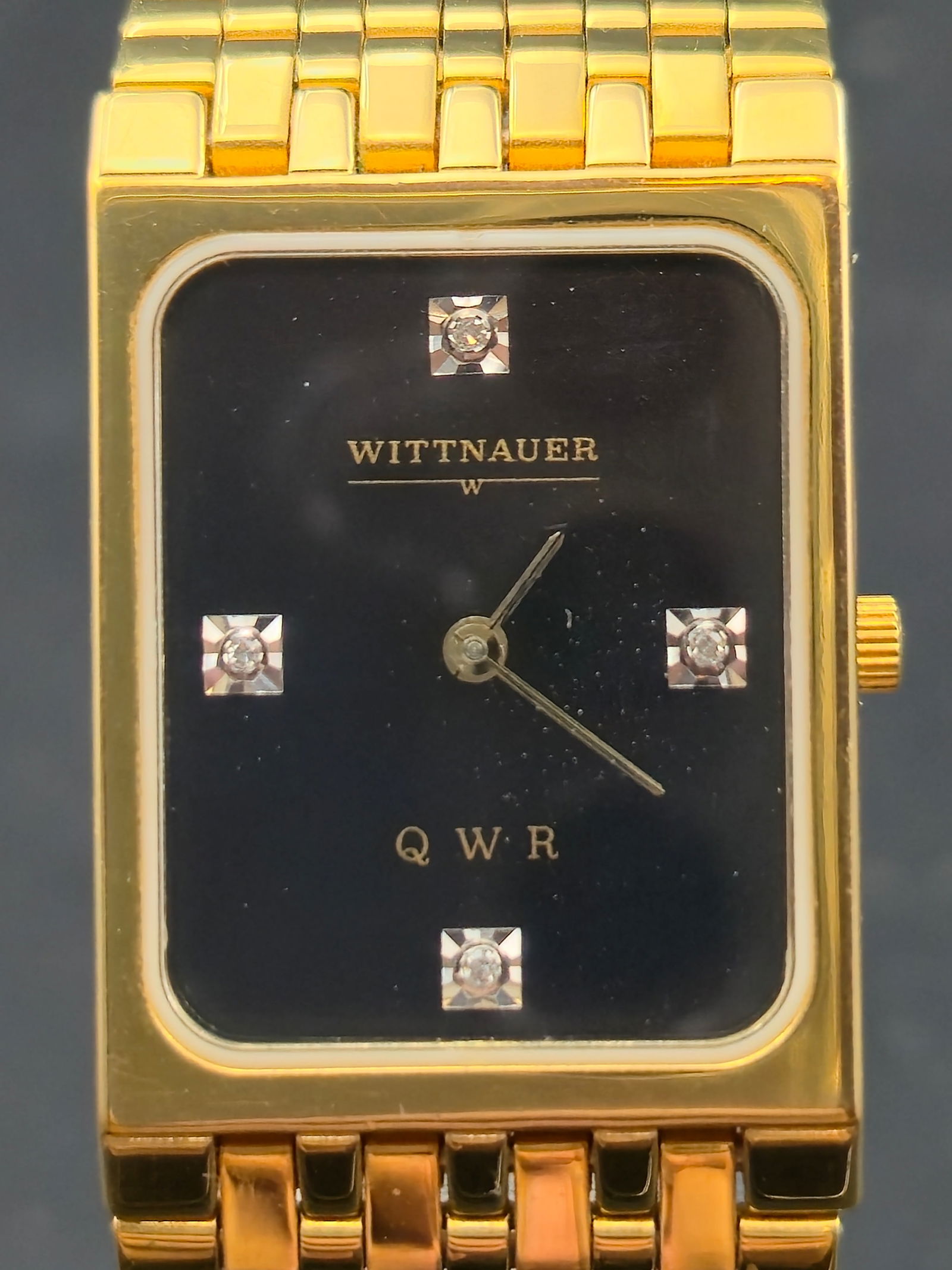 1991 Wittnauer Diamond Quartz Rectangular Gold Tone Watch Engraved 23mm Running: Vintage Wittnauer rectangular diamond-accent quartz wristwatch, engraved presentation piece dated 1991. Black dial with four diamond-set hour markers and gold-tone hands. Gold-tone case fitted with a