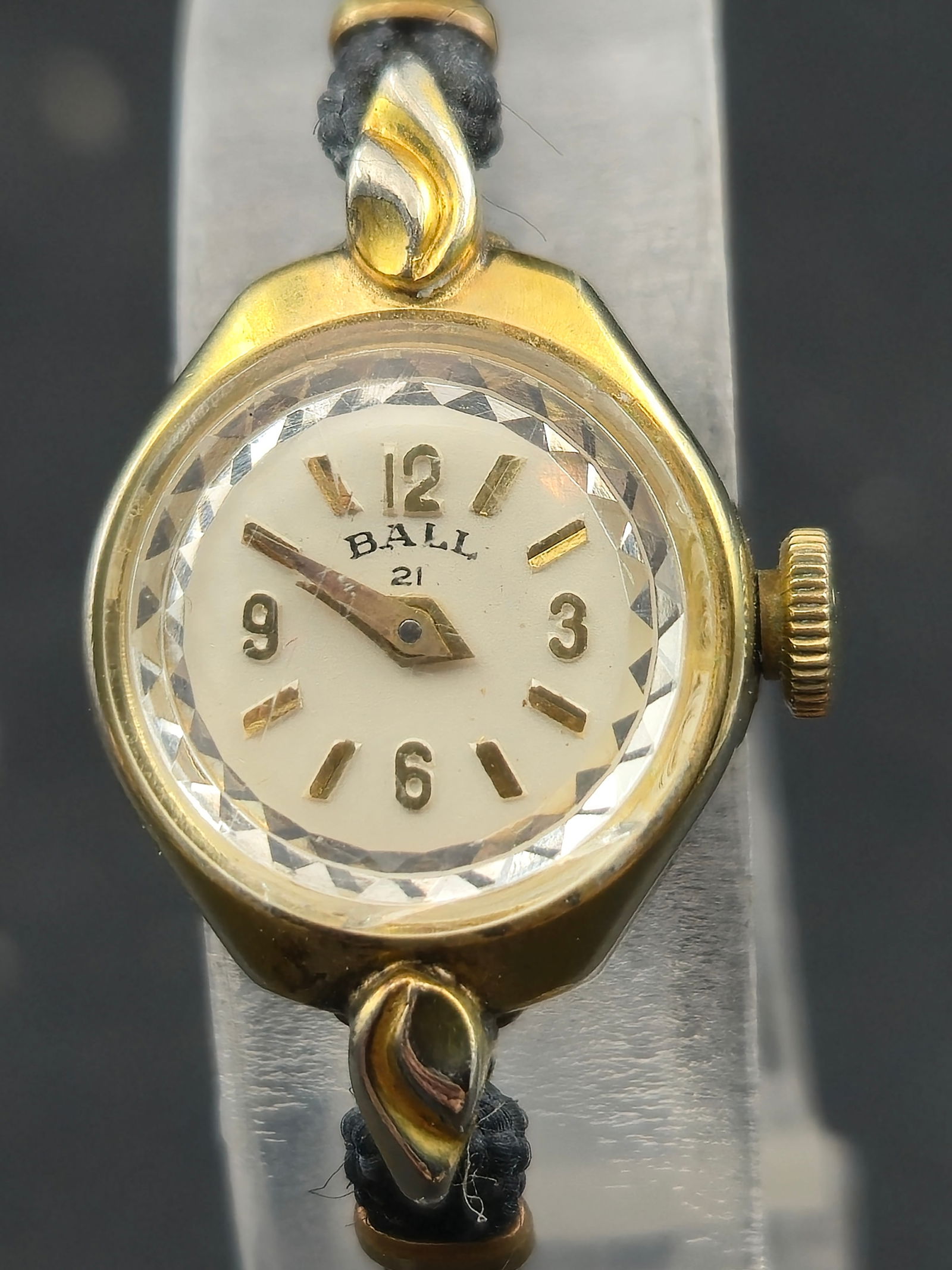 1940s Ball Watch Company Ladies Pendant Watch 21J 17mm: Vintage Ball Watch Company ladies pendant-style wristwatch dating to the 1940s. Small round gold-tone case with rope-style lugs and faceted crystal. Dial is signed Ball 21 with applied gold numerals a