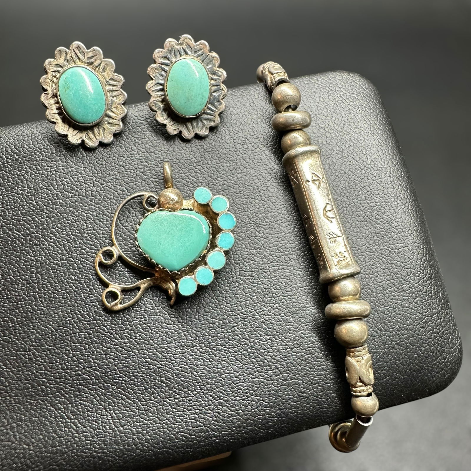 6.5"/20 Native American Sterling Silver ID Bracelet Turquoise Earrings & Pendant Lot: 6.5"/20 Native American Sterling Silver ID Bracelet Turquoise Earrings & Pendant Lot:Brand/Model: Unknown Native American artisan. No hallmark.Location: Unknown.Year Produced: Unknown. Condition: Over