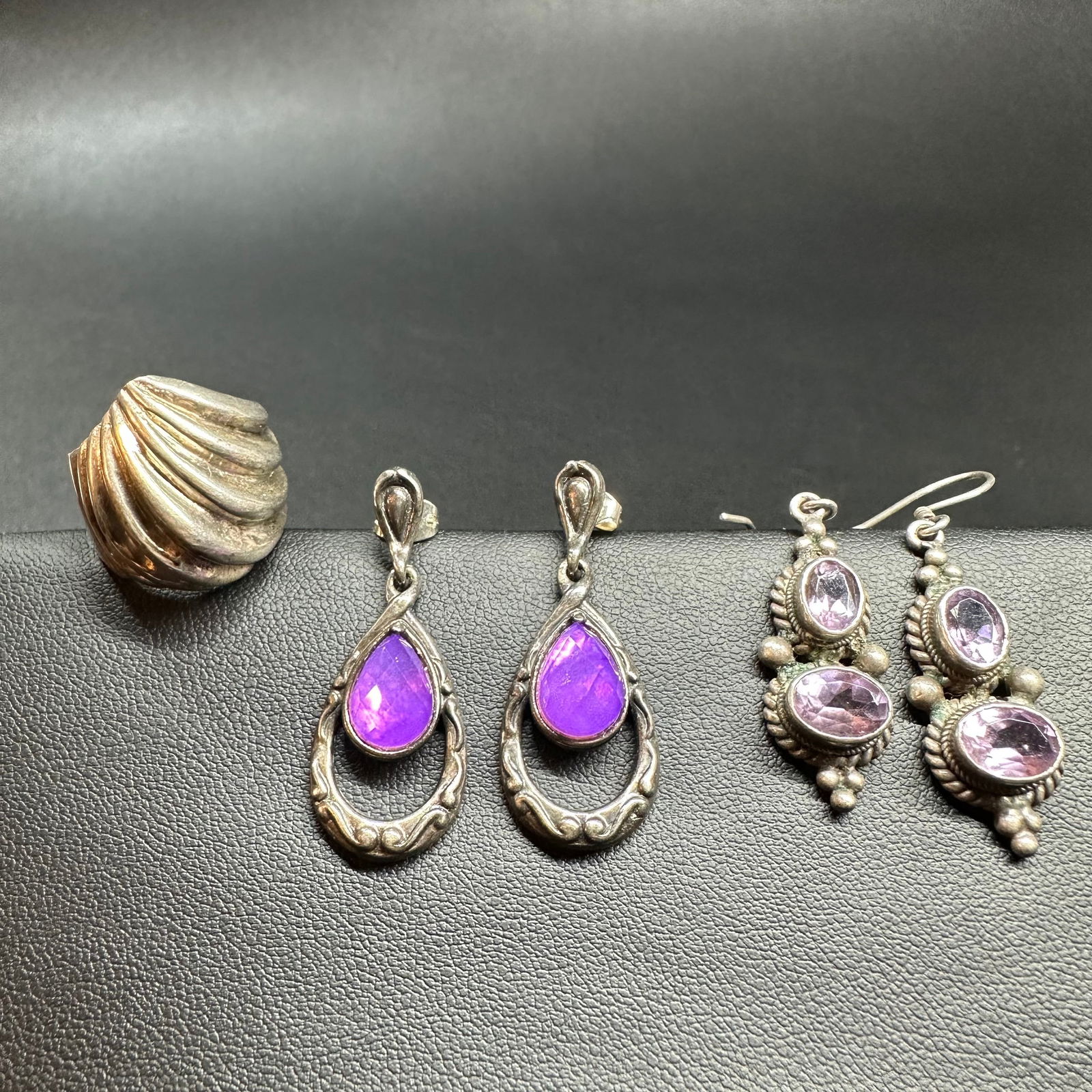 Sz7/22g 925 Sterling Silver Ring & Amethyst Earrings Lot: 22g 925 Sterling Silver Ring & Earring Lot:Brand/Model: Unknown; mixed styles.Manufacturer Location: Unknown.Year Produced: Unknown.Condition: Overall good pre-owned condition with light surface wear