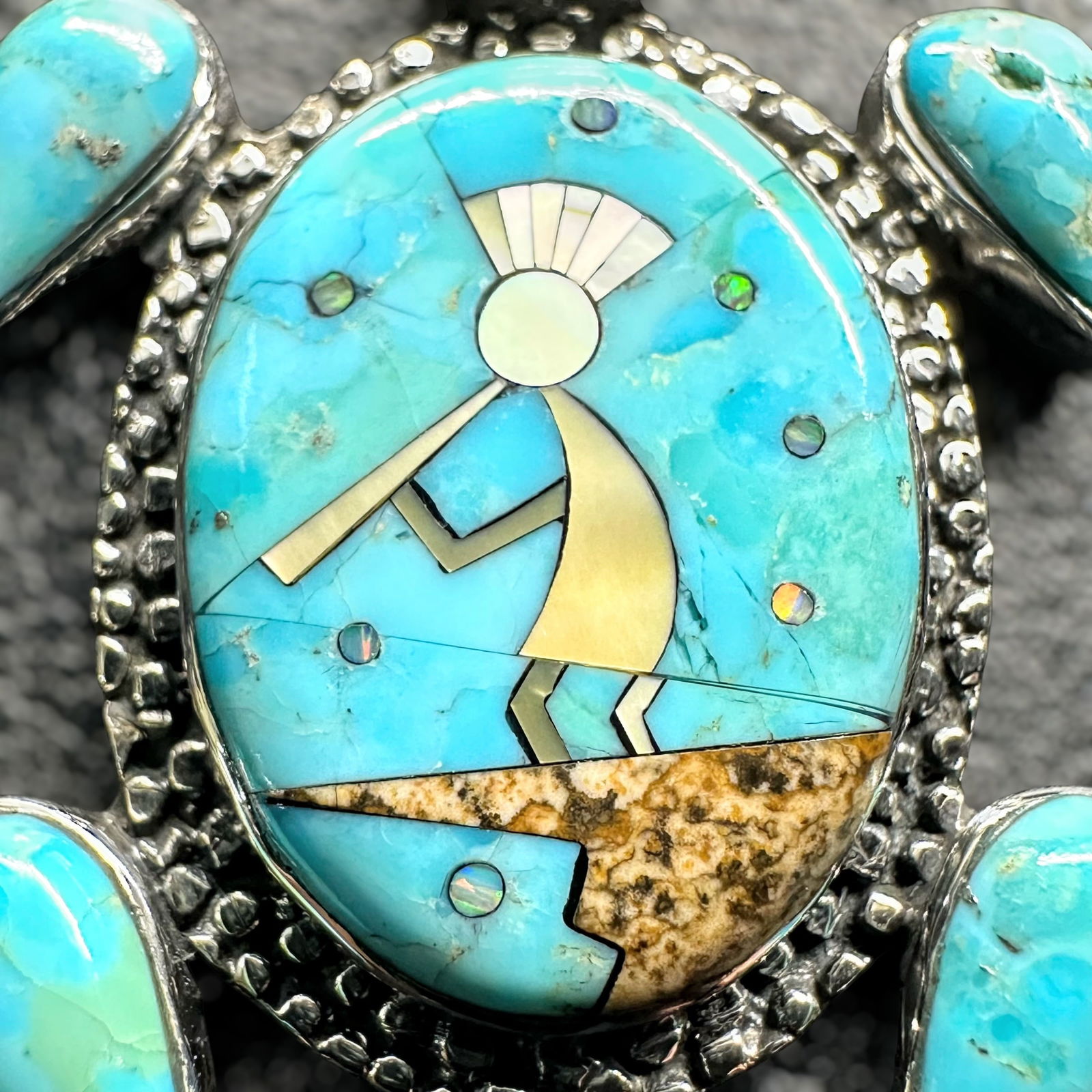 18g Native American Zuni Sterling Silver Opal Mother of Pearl Inlay Kachina/Turtle Pendant: 18g Native American Zuni Sterling Silver Opal Mother of Pearl Inlay Kachina/Turtle Pendant:Brand/Model: Unintelligible hallmark. Native American artisan. Zuni Inlay.Manufacturer Location: Not marked.Y