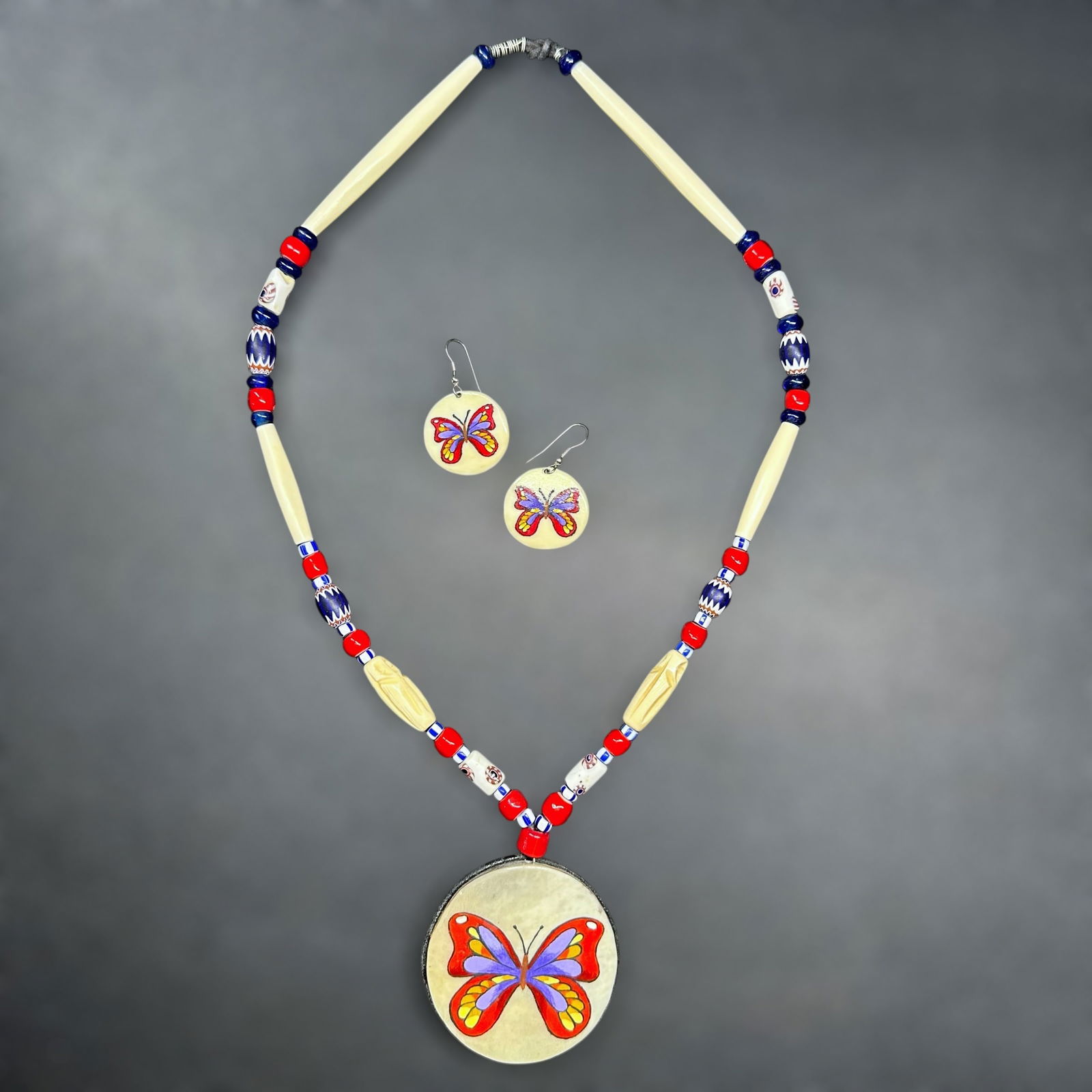 18”/82g Native American Hand Painted Bone Butterfly Beaded Necklace & Earring Set: 18”/82g Native American Hand Painted Bone Butterfly Beaded Necklace & Earring Set:Brand/Model: Unknown. Manufacturer Location: Not marked.Year Produced: Unknown.Condition: Overall good condition