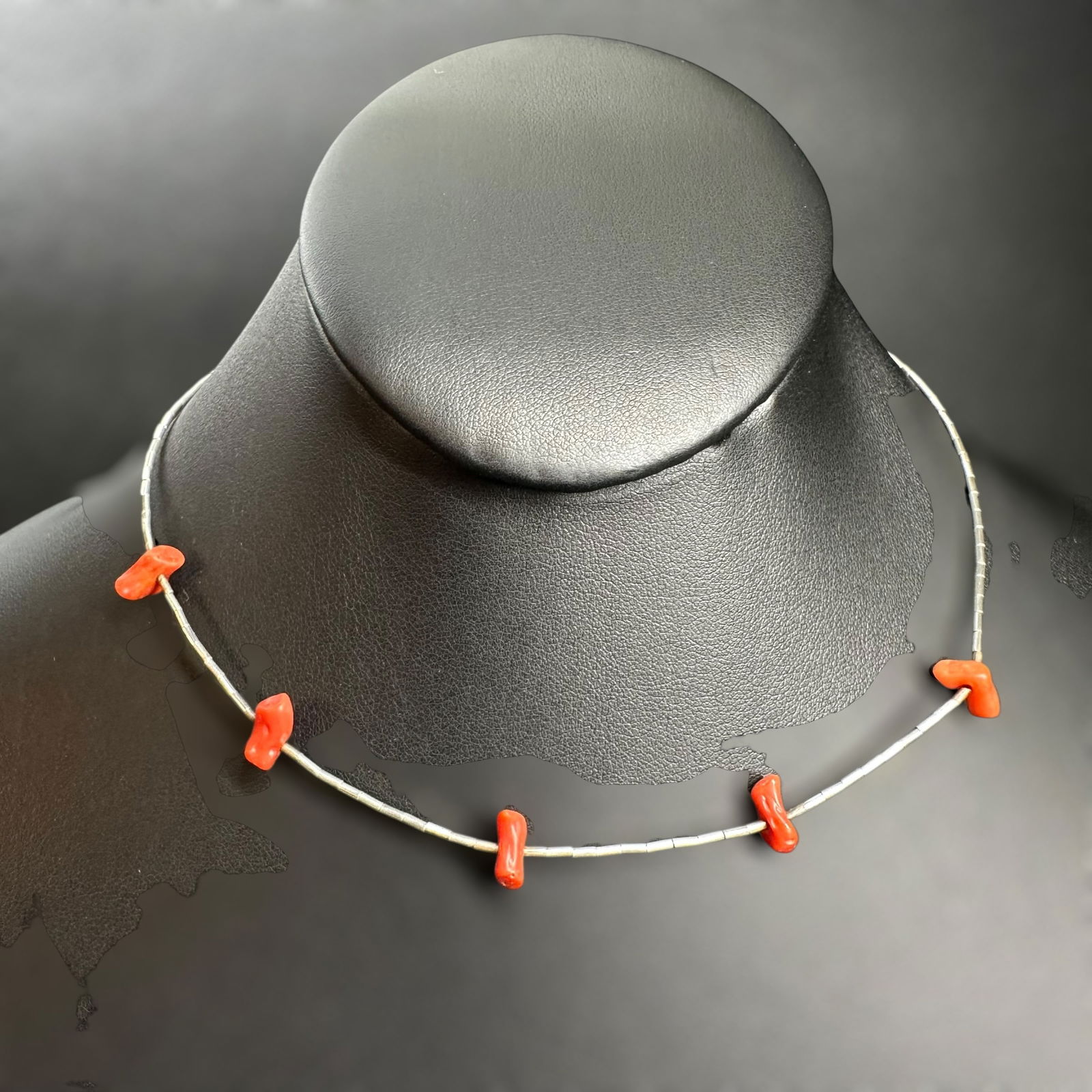 10"/5g Native American Liquid Sterling Silver Coral Necklace: 10"/5g Native American Liquid Sterling Silver Coral Necklace:Description:Brand/Model: No hallmark. Unknown. Native American style.Manufacturer Location: Not marked.Year Produced: Unknown.Condition: Ov
