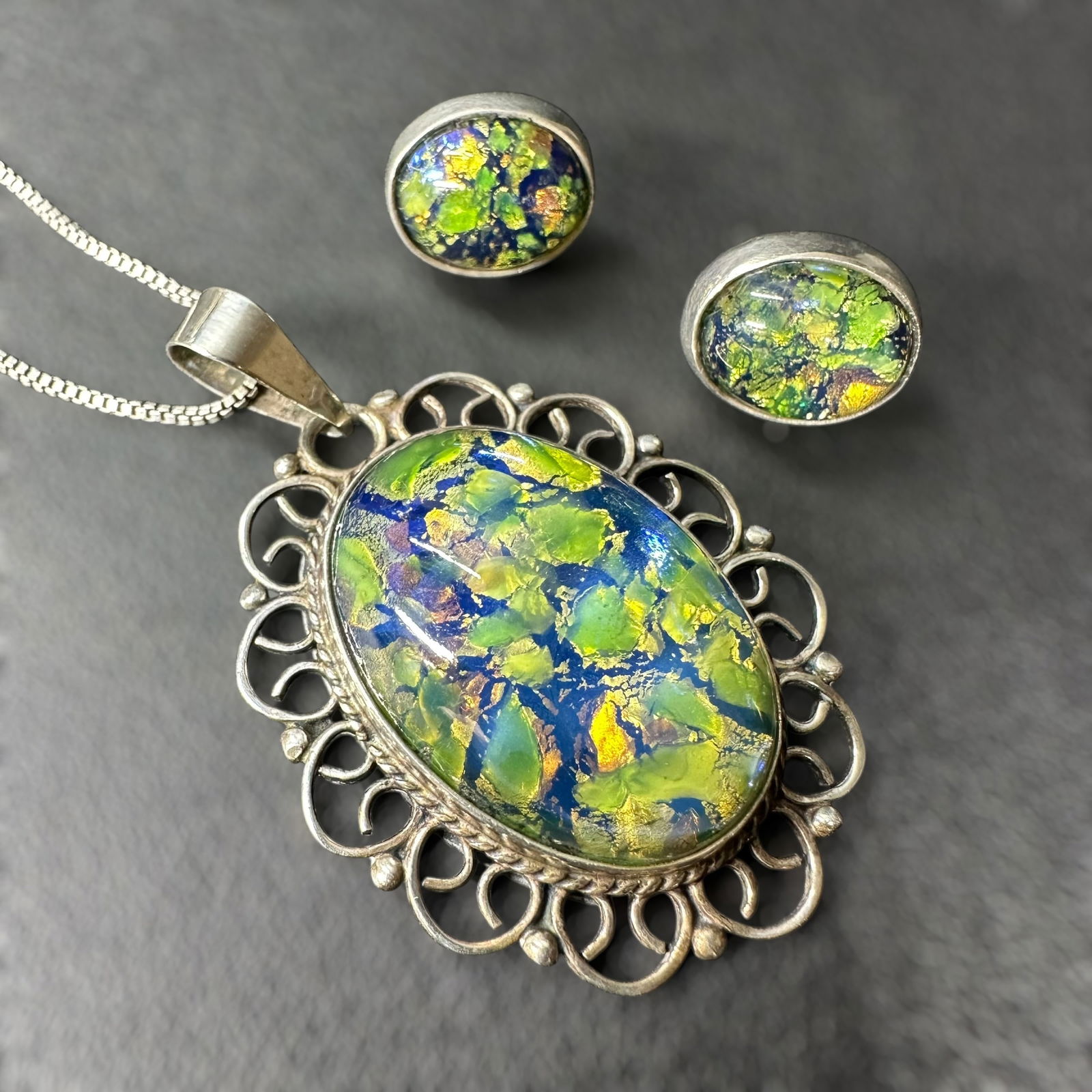 18"/20g Vintage Dichroic Art Glass Sterling Silver Necklace & Earrings Set: 18”/20g Sterling Silver Dichroic Glass Necklace & Stud Earrings Set:Brand/Model: Unmarked; matching necklace and stud earring set.Manufacturer Location: Pendant and earrings marked Mexico; chain