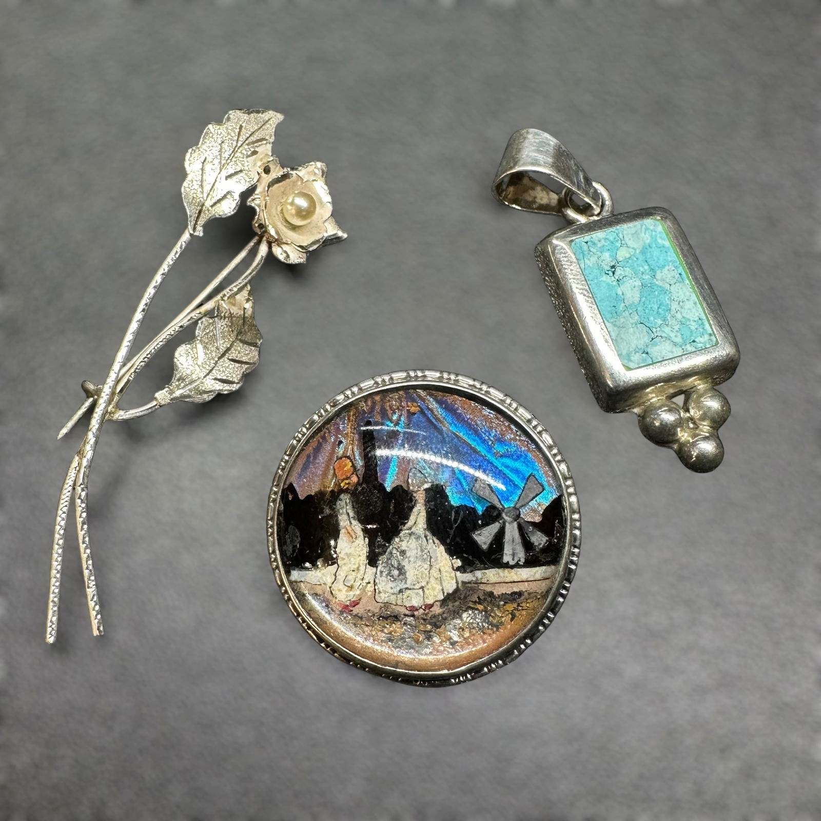 12g Sterling Silver Brooch & ATI 925 Turquoise Pendant Lot: 12g Sterling Silver Brooch & Turquoise Pendant Lot:Brand/Model: Marked "ATI" on pendant. Unidentified. Unknown makers; mixed styles.Manufacturer Location: England; iridescent picture brooch. Other pie