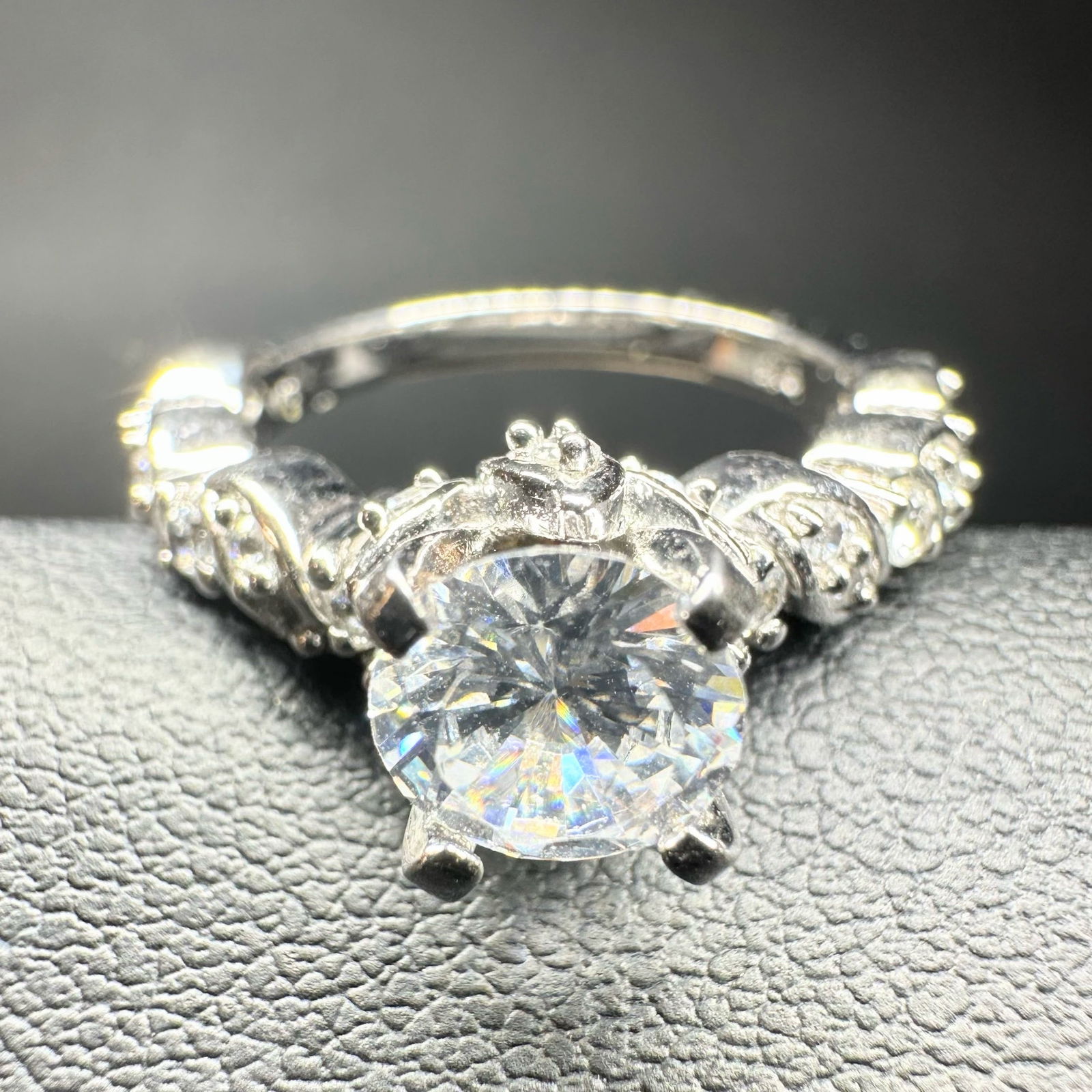 Sz6.5/4g Sz6.5/4g 925 Sterling Silver & Faceted Cubic Zirconia Ring: Sz6.5/4g Sz6.5/4g 925 Sterling Silver & Faceted Cubic Zirconia Ring:Brand/Model: Unknown brand.Manufacturer Location: Not marked.Year Produced: Unknown.Condition: Overall good condition with light sur