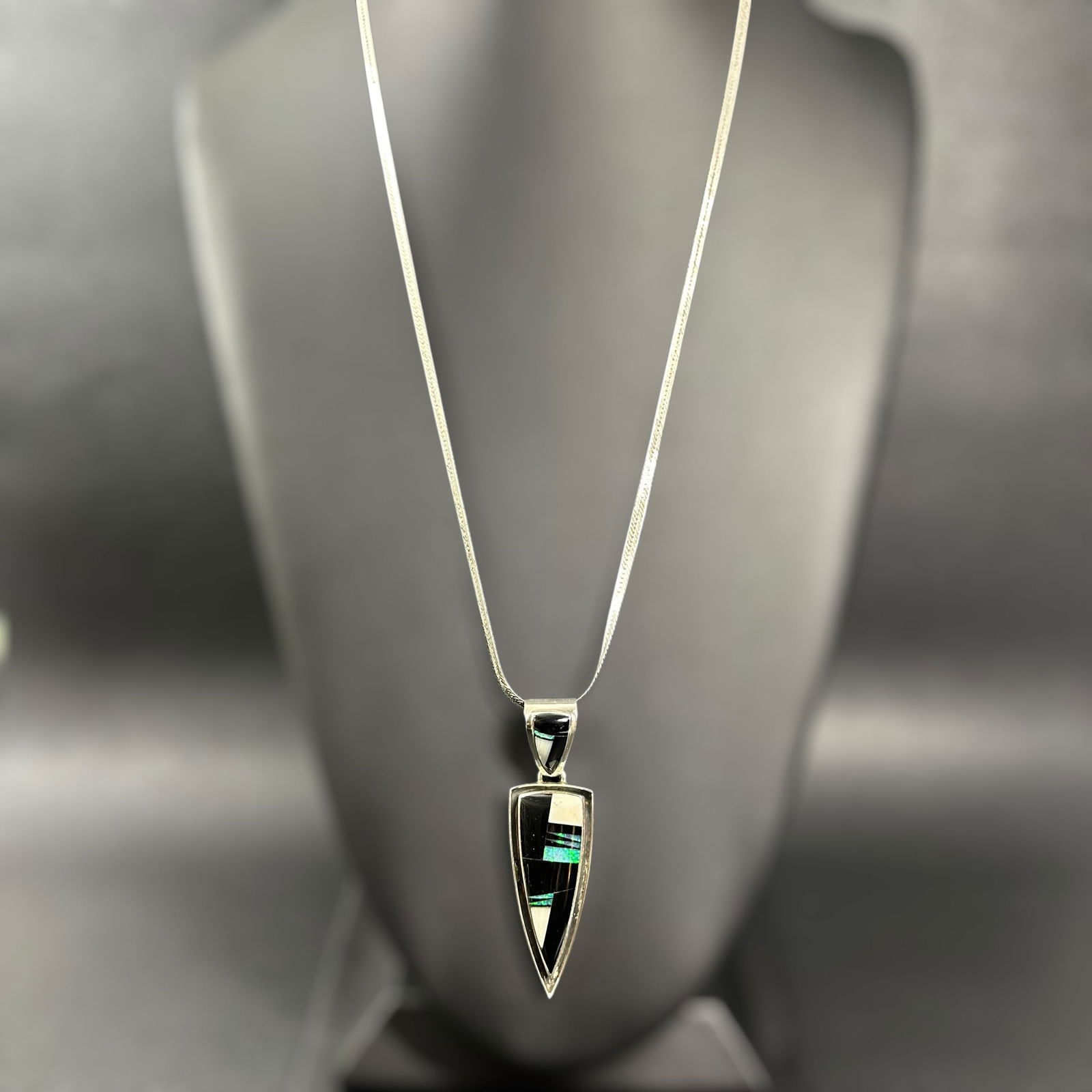 25"/25g Native American Cathy Webster Navajo Onyx Opal Mother of Pearl Inlay Pendant Necklace: 25"/25g Native American Cathy Webster Navajo Onyx Opal Mother of Pearl Inlay Pendant Necklace:Brand/Model: Hallmark & Pictograph; "C. Webster" accompanied. with feather. Navajo; artisan, Cathy Webster