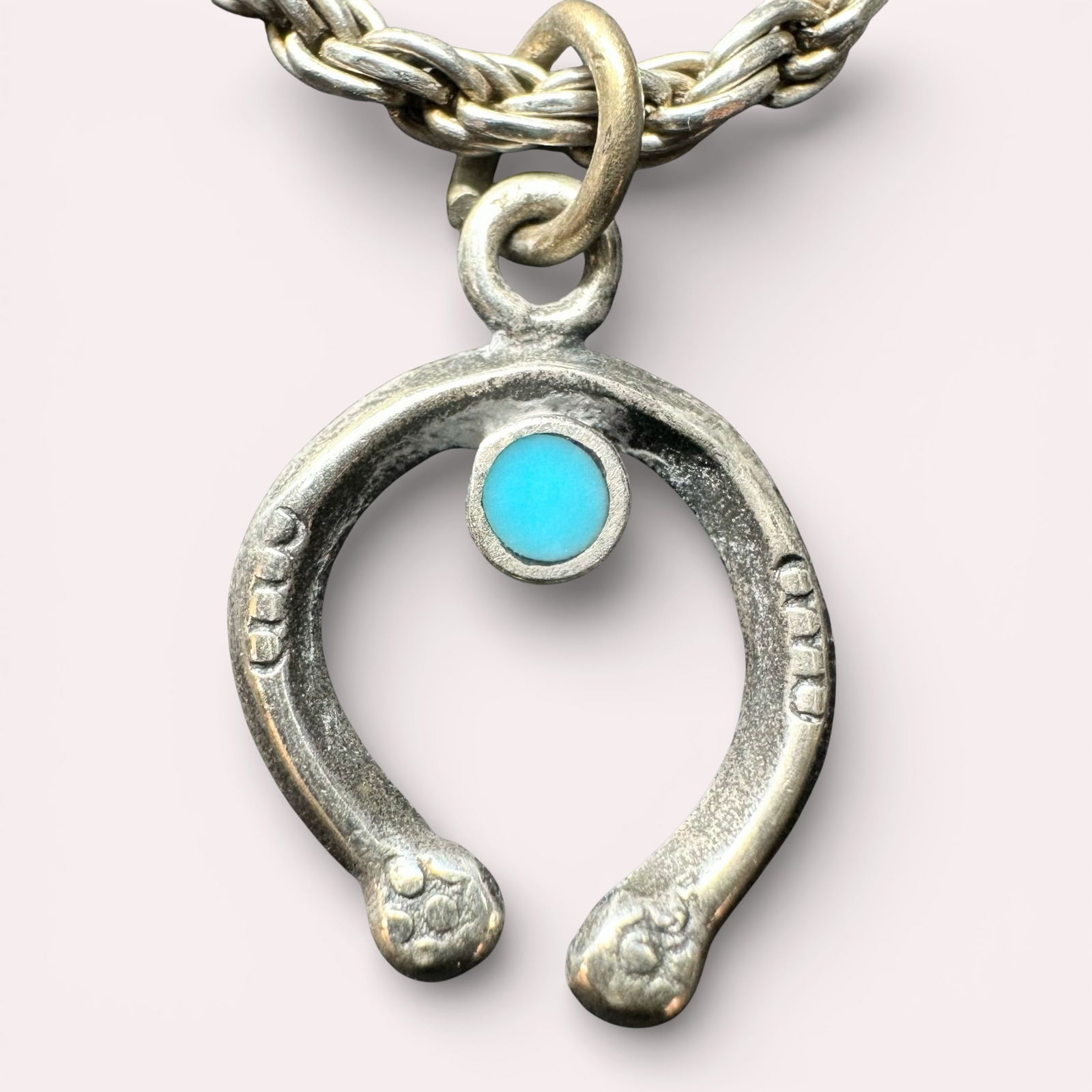 7.25"/5g 925 Sterling Silver Twisted Chain Bracelet w/ Native American Turquoise Naja Charm: 7.25"/5g 925 Sterling Silver Twisted Chain Bracelet w/ Native American Turquoise Naja Charm:Brand/Model: Unknown.Manufacturer Location: Not marked.Year Produced: Unknown.Condition: Good overall condit