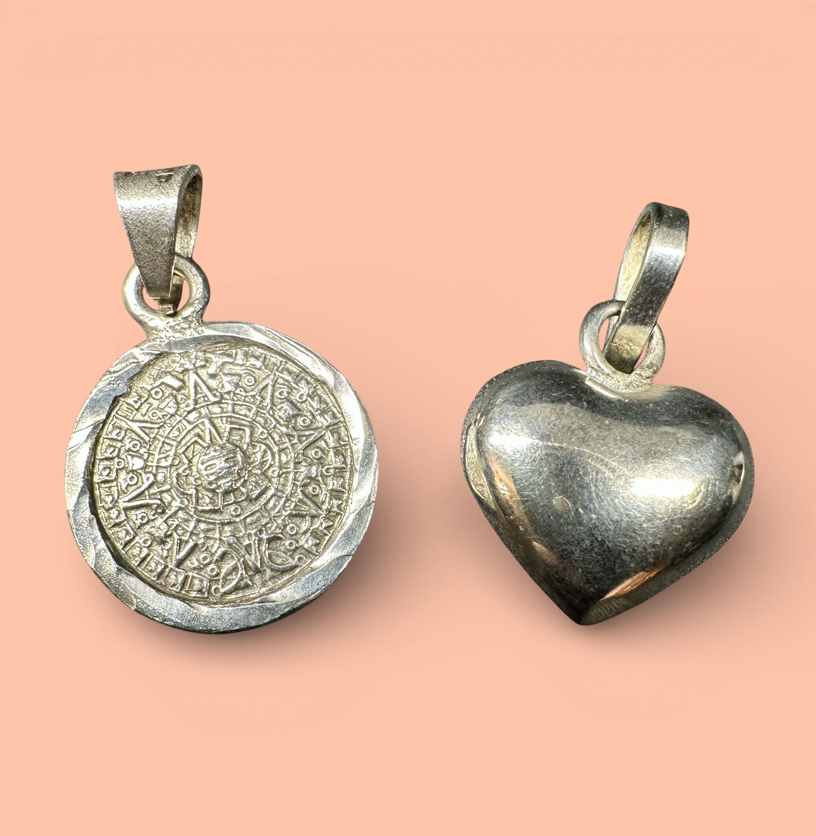 8g Mexican 925 Sterling Silver Mayan Calendar & Bubble Heart Pendant Lot - 2 Pc: 8g Mexican 925 Sterling Silver Mayan Calendar & Bubble Heart Pendant Lot - 2 Pc:Brand/Model: Unknown.Manufacturer Location: Mexico (Mayan pendant marked “Mexico 925”).Year Produced: Unknown.Co