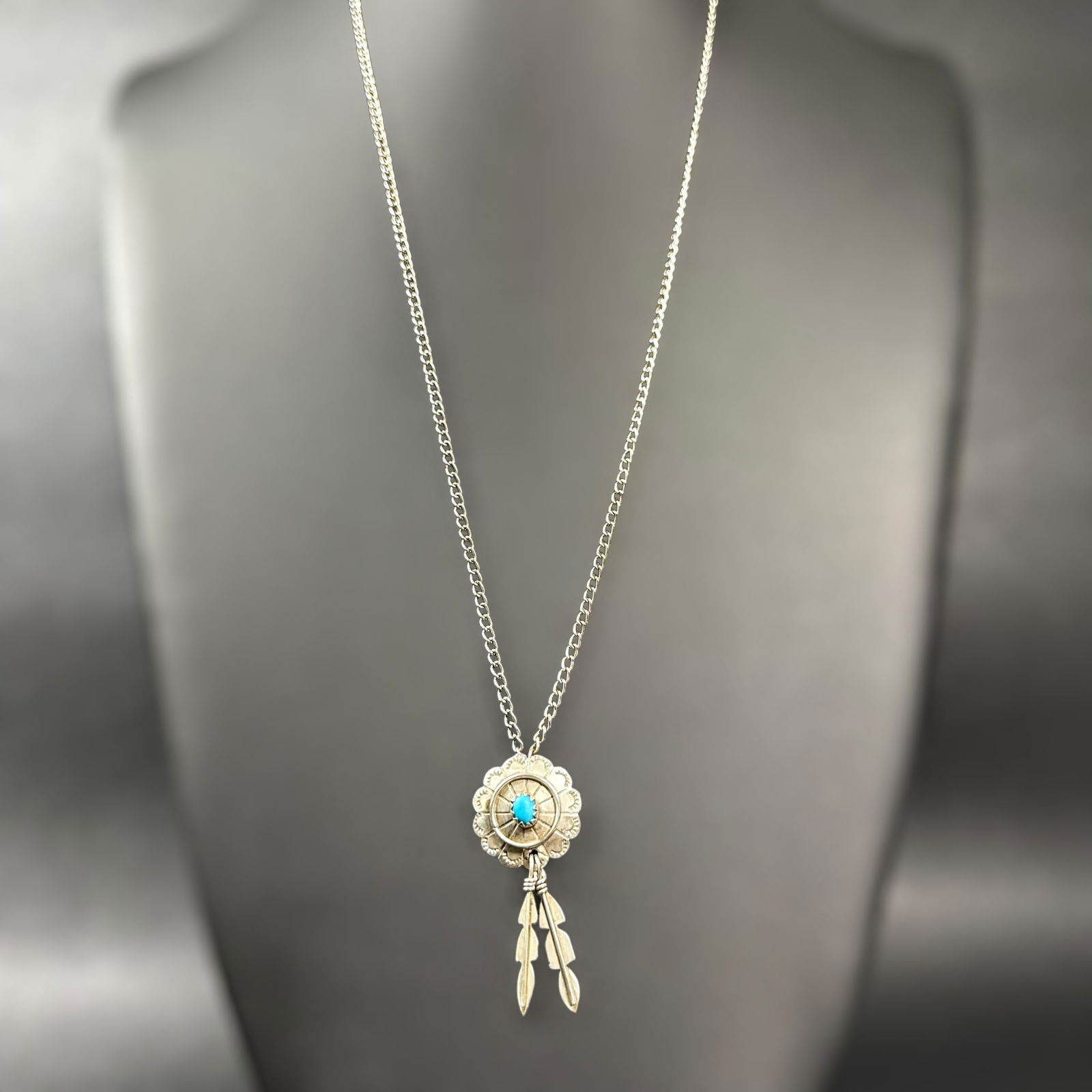 24”/7g Native American Sterling Silver Turquoise Concho & Feather Pendant Necklace: 24”/7g Native American Sterling Silver Turquoise Concho & Feather Pendant Necklace:Brand/Model: No hallmark; Native American concho style pendant. Unknown.Manufacturer Location: Not marked.Year