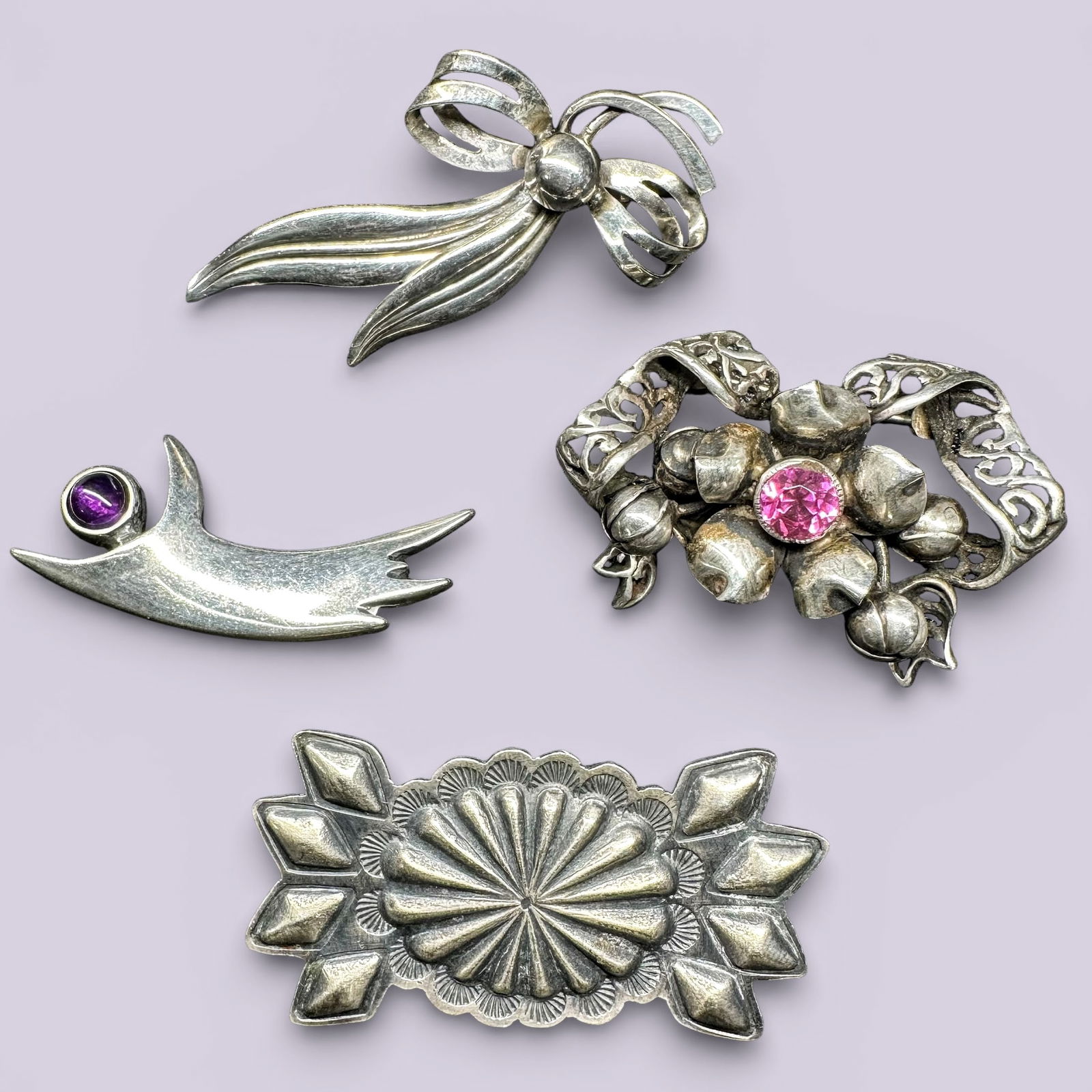 37g Vintage Sterling Silver Amethyst Faceted pink Stone Mixed Brooch Lot - 4Pc: 37g Vintage Sterling Silver Amethyst Faceted pink Stone Mixed Brooch Lot - 4Pc:Brand/Model: Mixed; one marked “Sterling Denmark.”Manufacturer Location: Denmark (bow brooch marked); others not