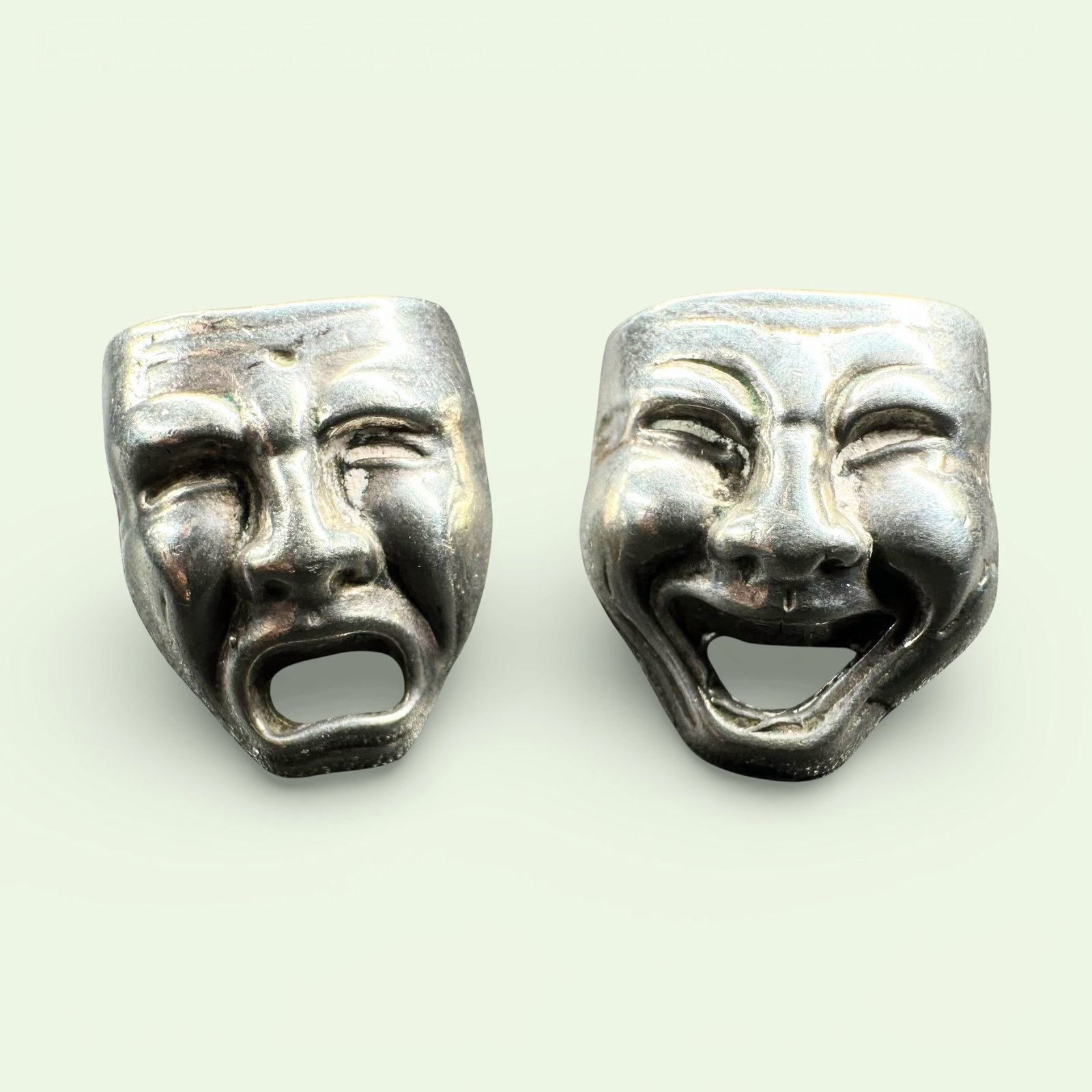 6g Vintage Sterling Silver Thespian Stud Earrings: 6g Vintage Sterling Silver Thespian Stud Earrings:Brand/Model: Unmarked; thespian mask motif.Manufacturer Location: Not marked.Year Produced: Unknown.Condition: Good overall condition with visible sur