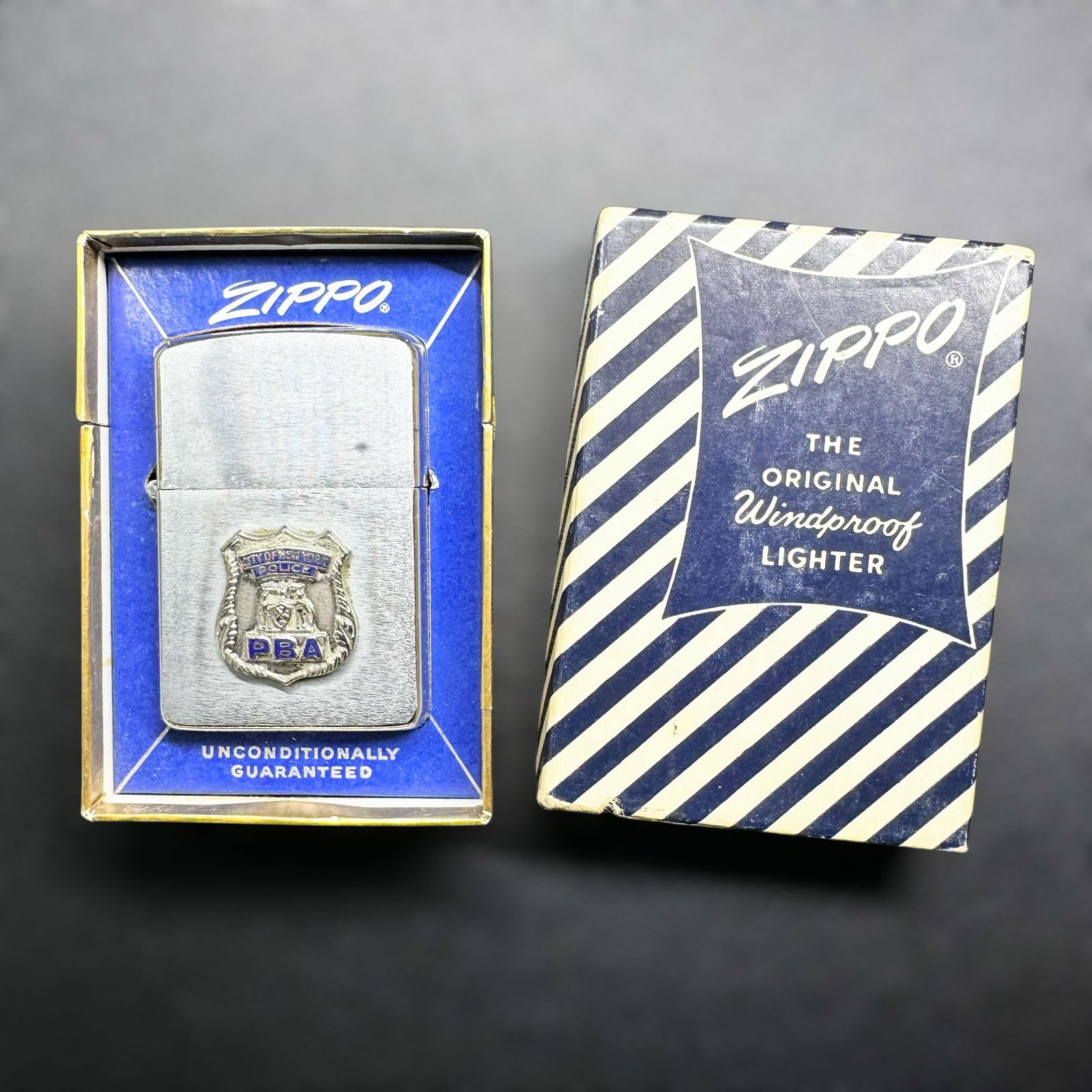 59g Vintage Mack Truck Zippo Lighter: 59g Vintage Mack Truck Zippo Lighter:Brand/Model: Zippo Windproof Lighter with Mack Truck Emblem.Manufacturer Location: Bradford, PA.Year Produced: Unknown.Condition: Pre-owned condition with visible