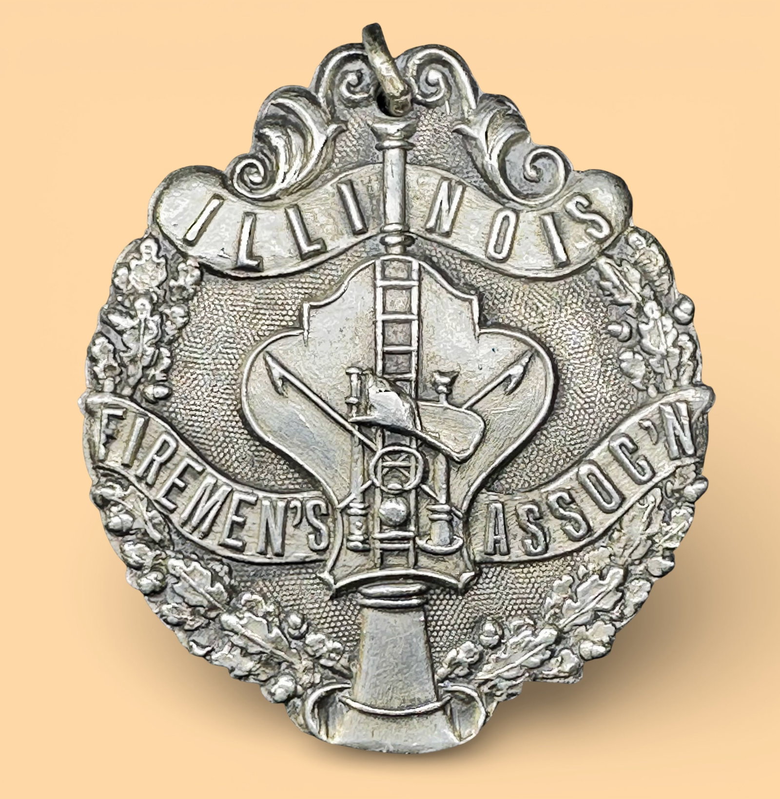 10g Vintage Pewter "Illinois Firemen’s Assoc'n" Medal Pendant: 10g Vintage Sterling Silver "Illinois Firemen’s Assoc'n" Medal Pendant:Brand/Model: Illinois Firemen’s Association Medal.Manufacturer Location: Marked “Steiner Eng. Co. St. Louis.”Year Pro