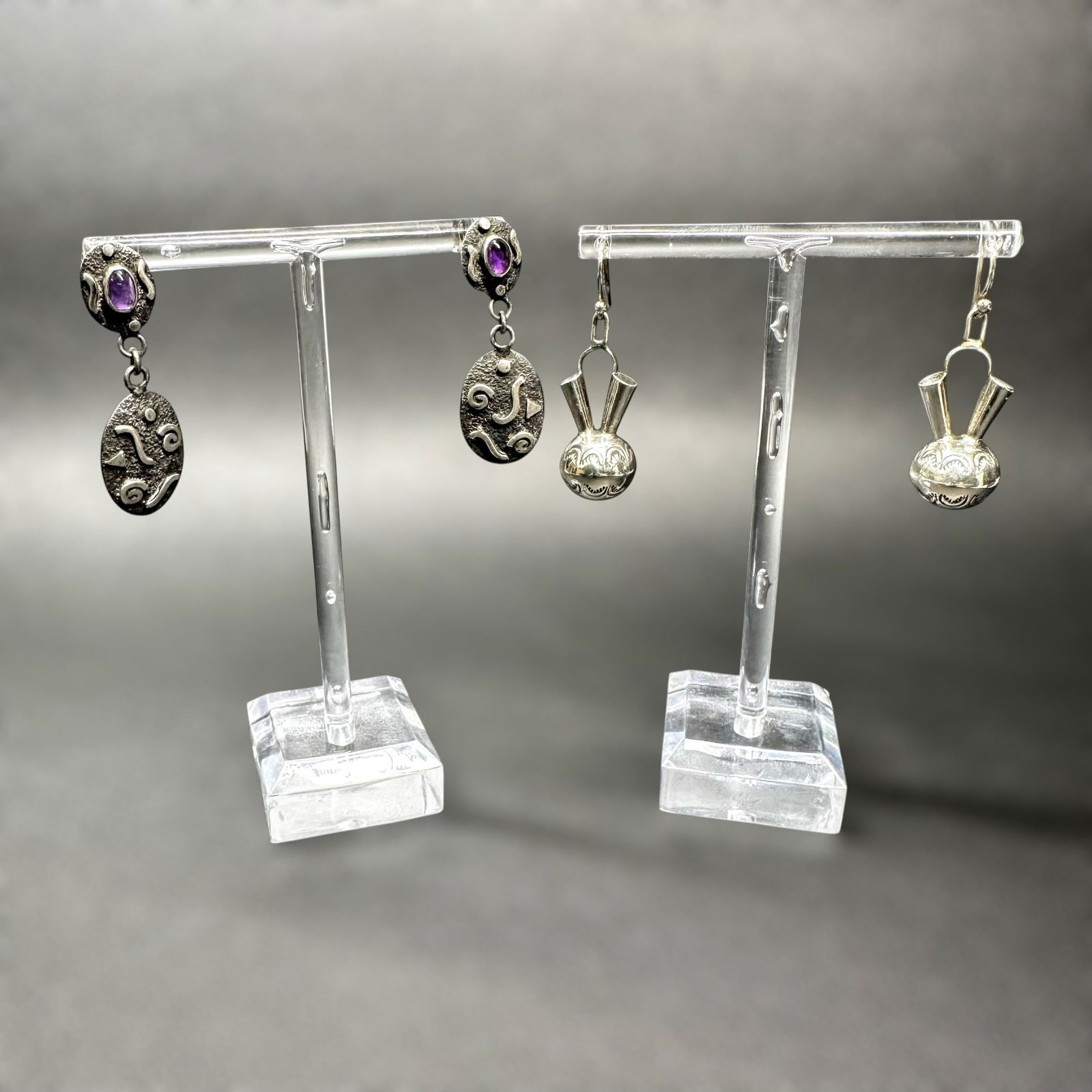 12g Native American 925 Sterling Silver Amethyst Dangle Earring Lot: 12g Native American 925 Sterling Silver Amethyst Dangle Earring Lot:Brand/Model: Unknown; two pairs. No hallmark.Manufacturer Location: Not marked.Year Produced: Unknown.Condition: Overall good condit