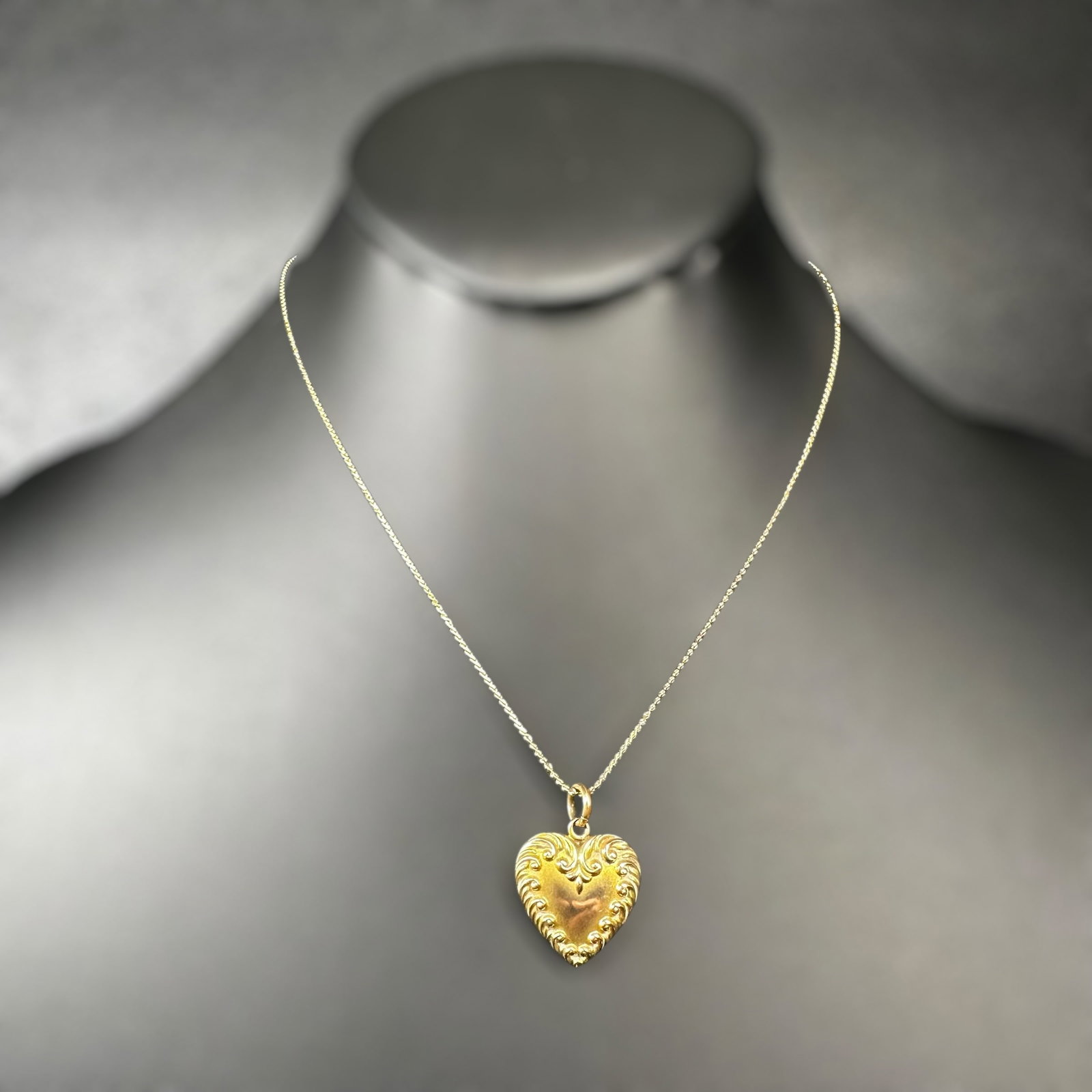 15"/3g Christian Dior New York Gold Heart Pendant Necklace: 15"/3g Christian Dior New York Gold Heart Pendant Necklace:Brand/Model: Unknown.Manufacturer Location: Not marked.Year Produced: Unknown.Condition: Good condition with light surface wear and minor scr