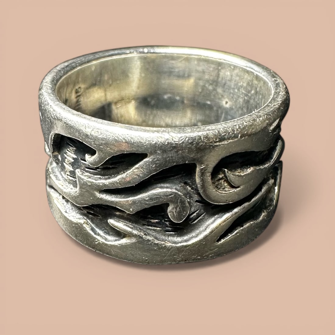 Sz6.5/9g Native American Sterling Silver Wave Band Ring: Sz6.5/9g Native American Sterling Silver Wave Band Ring:Brand/Model: Unintelligible hallmark.Manufacturer Location: Not marked.Year Produced: Unknown.Condition: Good overall condition with surface wea