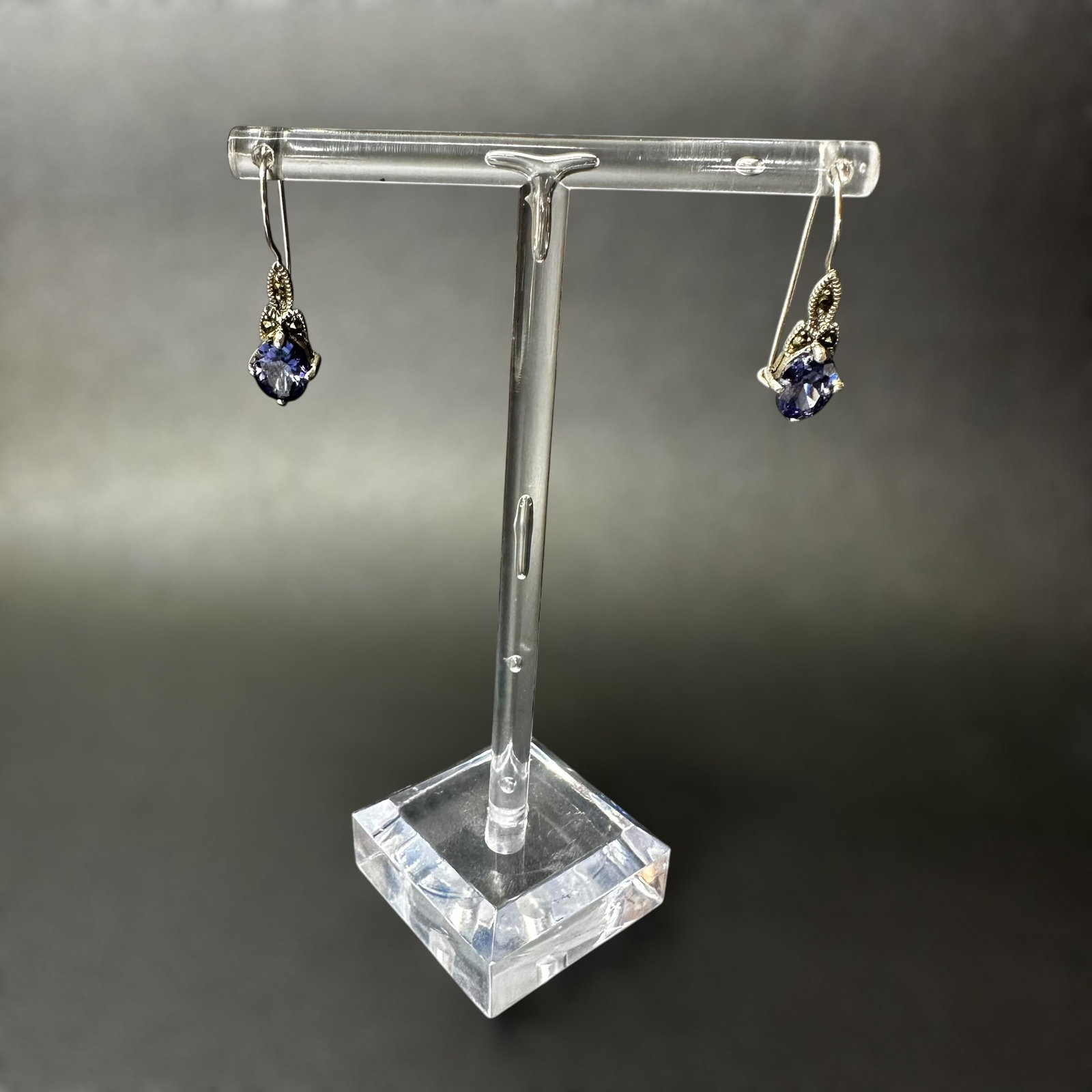 8g 925 Sterling Silver Faceted Purple Stone Marcasite Drop Earrings: 8g 925 Sterling Silver Faceted Purple Stone Marcasite Drop Earrings:Brand/Model: No hallmark.Manufacturer Location: Not marked.Year Produced: Unknown.Condition: Good condition with light surface wear