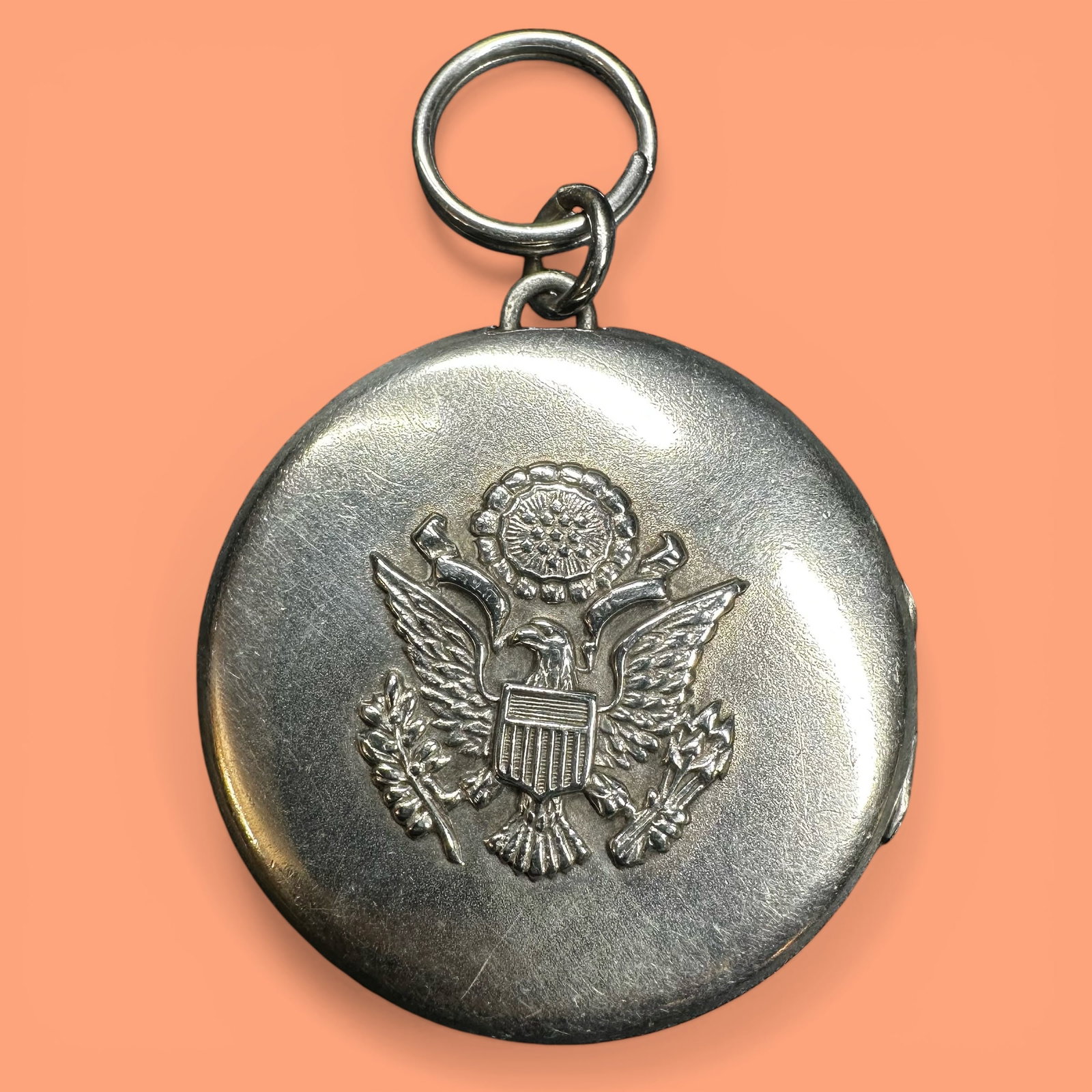 23g JMF Co. Sterling Silver Eagle "Sweetheart" Locket Pendant: 23g JMF Co. Sterling Silver Eagle "Sweetheart" Locket Pendant:Brand/Model: JMF Co. The J.M. Fisher Company. Manufacturer Location: Attleboro Mass.Year Produced: 1915.Condition: Good vintage condition