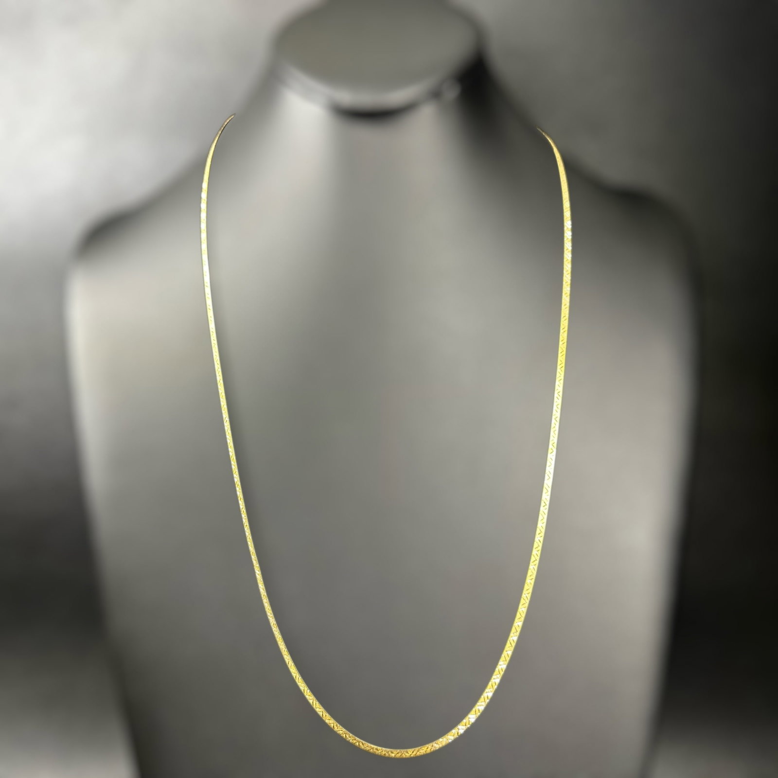 23”/4g 925 Italy Gold Herringbone Necklace: 23”/4g 925 Italy Gold Herringbone Necklace:Brand/Model: No hallmark.Manufacturer Location: Italy.Year Produced: Unknown.Condition: Good condition with light surface wear and minor finish wear co