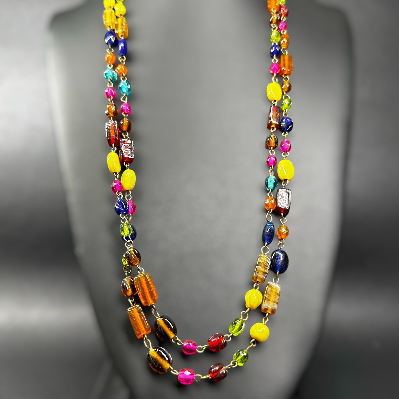 56”/71g Icing Multi-Color Venetian Glass Double Strand Bead Necklace: 56”/71g Multi-Color Venetian Glass Double Strand Bead NecklaceBrand/Model: ICING.Manufacturer Location: Not marked.Year Produced: Unknown.Condition: Good condition with minor surface wear consis