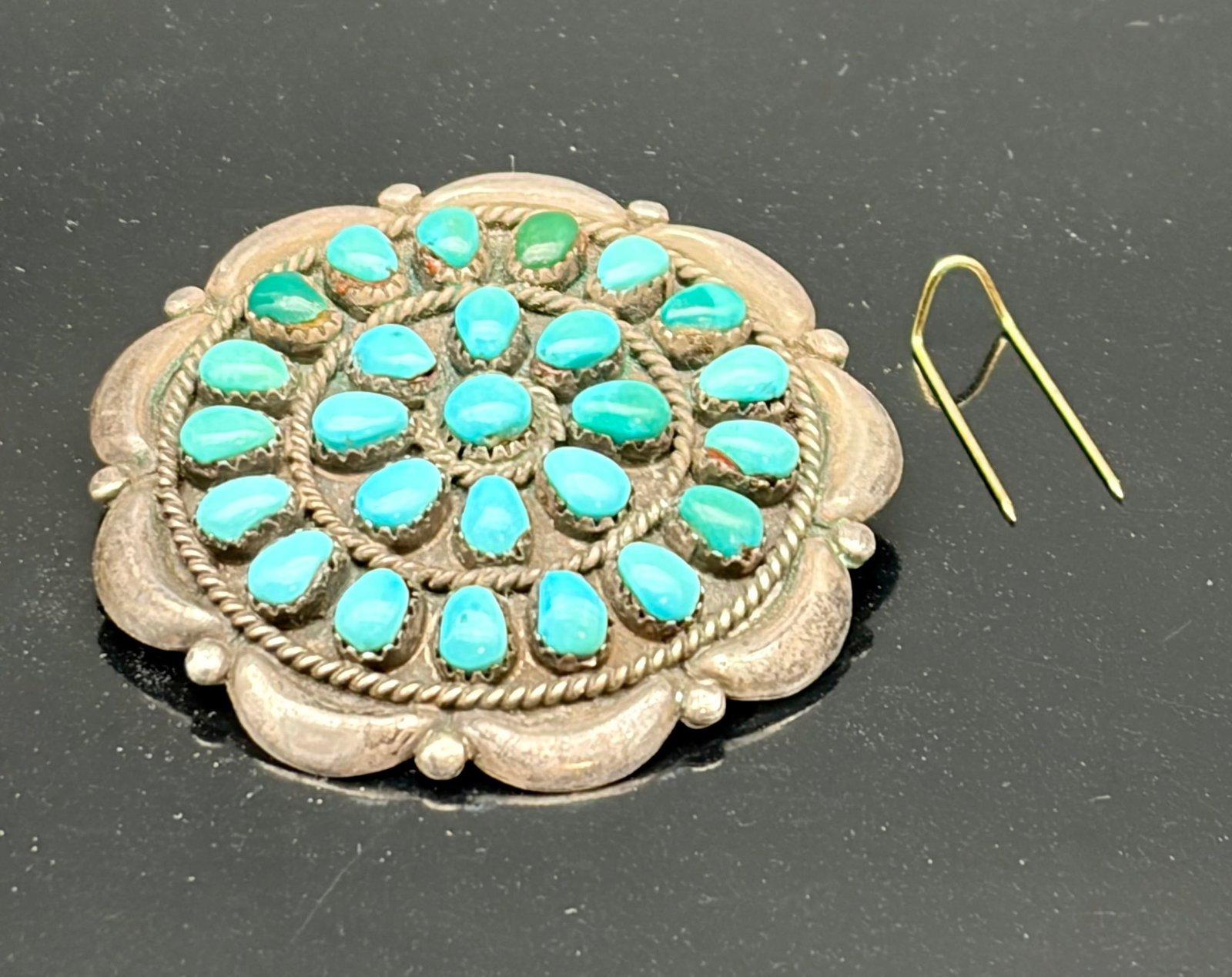 Vintage Sterling Silver Inlay Angel Brooch – Southwestern Winged Figure Pin: Striking vintage sterling silver brooch depicting a stylized winged figure, often interpreted as an angel or celestial dancer. The design features graceful, sweeping wings formed from inlaid stones—